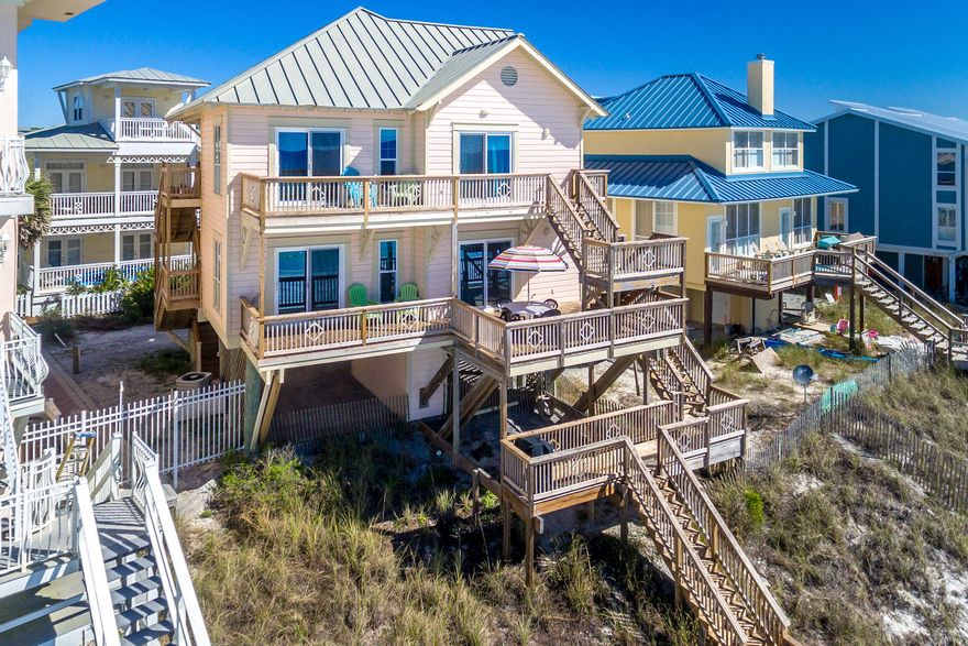 Outstanding Gulf Front duplex in desirable Eastern Lake area off County Hwy 30A. Dolphin Watch is appropriately named, with gulf views from every room. This property offers the best of easy beach living with ultimate privacy. The beach house is at the dead end of secluded Eastern Lake Road. Walk out your private beach boardwalk onto the sugar white sand of the Emerald Coast. Just a short walk down the beach is Eastern Lake, one of the 15 rare Coastal Dune Lakes in South Walton County--and only found in a handful of places in the world. The interior and exterior of this duplex have been very well maintained, and some major updates have already been made, such as new decking, new AC units, and more. This beach house only needs a few cosmetic updates to become an ultimate beachfront getaway!