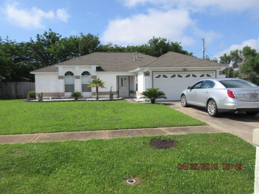 Cute, Cute home. Vaulted ceilings, screen porch to enjoy. Real wood flooring in the living room, dining room, dining area and hall. Master bath is tiled and has a whirlpool tub and separate shower. All bedrooms have vaulted ceilings. Large screened porch and privacy fenced back yard. Lawn pump and sprinkler system for easier lawn maintenance. Only 7 miles from front gate to Hurlburt. Small pet only.