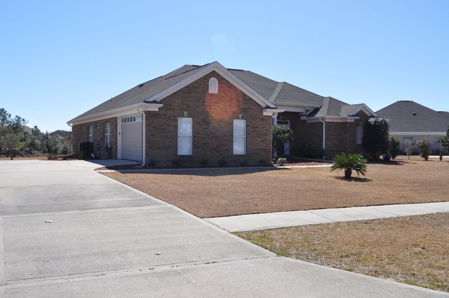 BIG Price Reduction on this Beautifully maintained four bedroom, three bath, golf course front home located in the gated community of Windswept Estates. As you enter the foyer you notice the soaring 12' ceilings that encompass the entry, formal dining room, and formal living room. This four-side brick home is immaculate and features an open concept living area with a gas fireplace as the focal point. The kitchen is open to the living area and breakfast dining, featuring solid surface counter-tops, stainless steel appliances, custom backsplash and walk in pantry. The floor plan offers split bedrooms with Jack-n-Jill bath and separate guest room with hall bath. This large .64 acre lot is situated on the 16th Tee Box and offers a saltwater, screened enclosed pool.