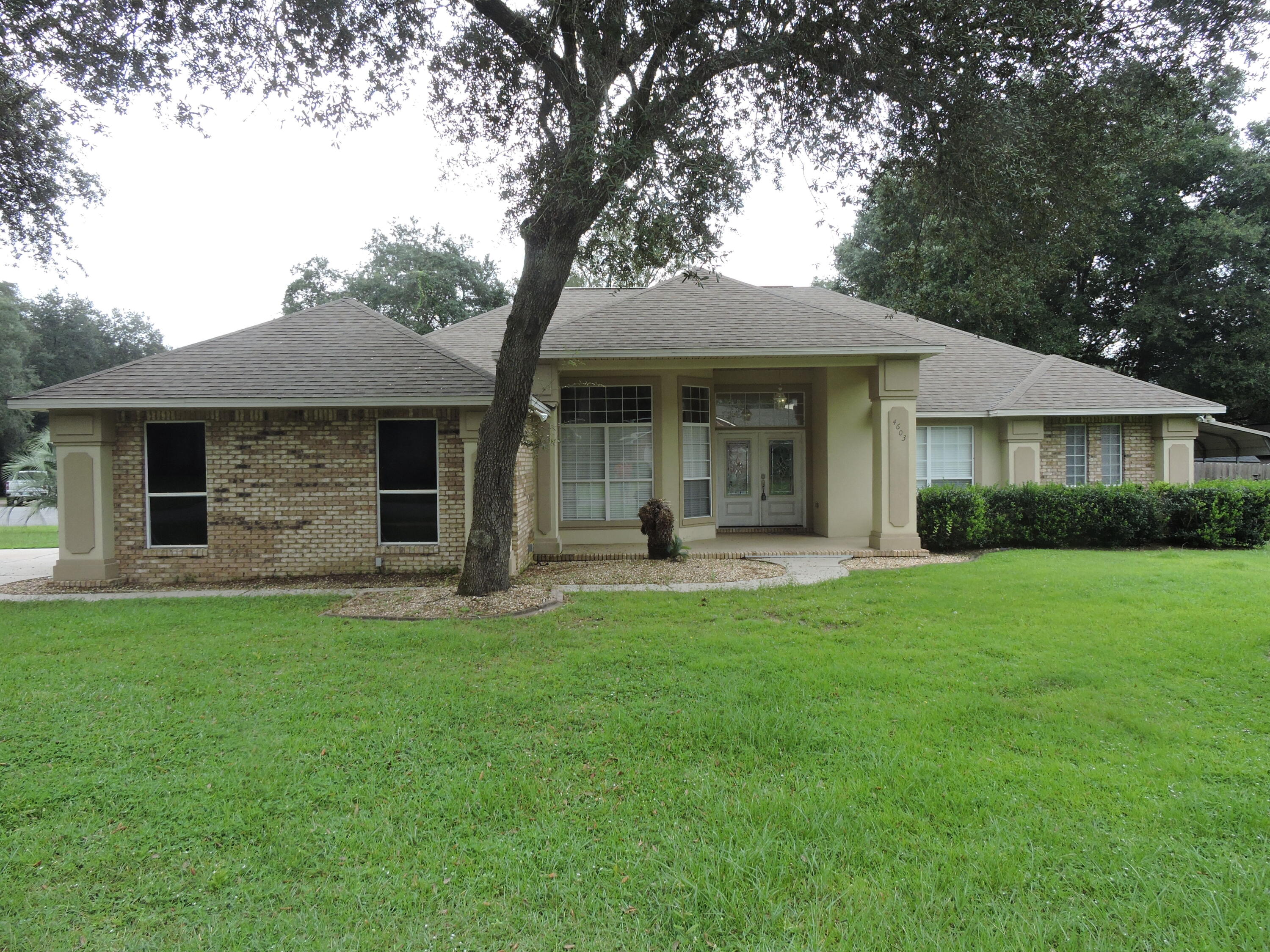 Available Now! - South of I-10 conveniently located just off of Live Oak Church Rd on a peaceful culdesac lot. This beautiful brick and stucco home features open concept kitchen/living dining room with a gas fireplace accenting the area. The master suite checks all the boxes with sitting area, large walk in closets, jetted tub with separate walk in shower. The kitchen features stainless steel appliances and granite counter tops. The additional bedrooms are nice sized with ample closet space. The home also has and office/flex room that could be used as a 4th bedroom off if living room. The home also have a florida room and patio area perfect for entertaining. the backyard is fenced and level with a cover for a camper or a boat. Schedule your showing today!