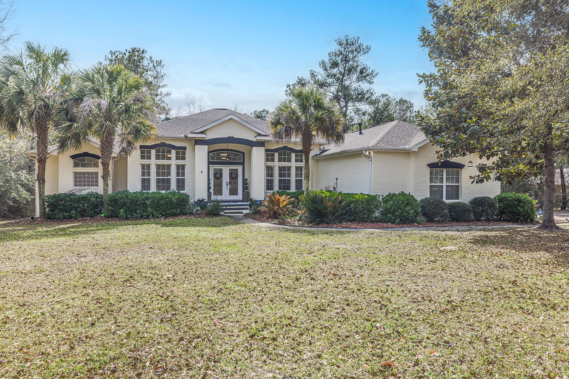 Welcome Home to the highly sought after neighborhood of Ashley Place; with stately homes on large private lots. This gorgeous home on one acre has plenty of curb appeal, with fresh exterior paint, a new roof, and plenty of trees for privacy. Heading in, you will notice the the light and bright airy feel. You are greeted with double entry doors and will be impressed with the attention to detail of this custom home; tall ceilings, an abundance of trim work, and large windows throughout. This elevated floor plan features a formal dining room, a formal living room with views of the gorgeous pool/lanai, a breakfast nook, and a comfortable family room featuring a gas fireplace. The kitchen has gorgeous stainless appliances, granite countertops, maple cabinetry, and plenty of counter space. The oversized master retreat is on the left wing of the home, the master bath features an oversized whirlpool tub, walk in shower, double vanities, and large walk-in closet. On the other wing of the house you will find 2 private guest suites connected with a jack and jill bathroom for convenience.There is a room off the front door that could be used as a fourth bedroom or office as well. If you love outdoor entertaining you will not be disappointed. The gorgeous pool (which has a new liner) and overflow hot-tub are sure to please. There is ample room for seating and grilling too. Do you have pets or need some room to play...there is a fenced in portion of the yard available for that too. Make your appointment to tour today! Buyer/Agent to verify all information deemed important.