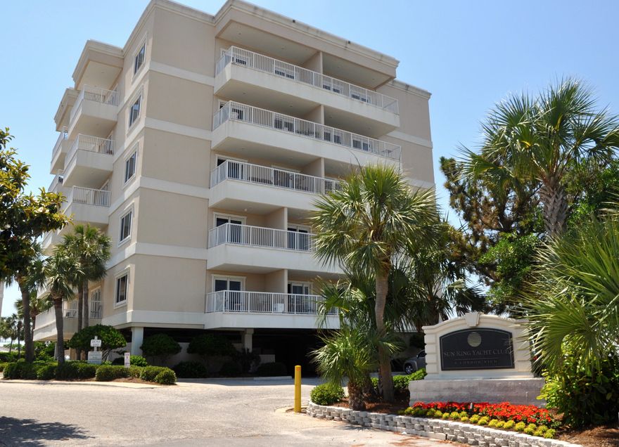 Holiday Isle - Harbor front condo. This 2B/1B condo on Destin Harbor has an open living and kitchen area and a large balcony that overlooks Destin Harbor. Don't miss this opportunity to buy water front property on Holiday Isle. Condo amenities include: access to canals and the harbor, access to Sun King Yacht Club building, two docks on the harbor & one on the canal which are available for boats ., harbor side pool, Tiki bar and a fish cleaning station. - Boat slips are assigned on a first come basis by the dock master and slips can accommodate a boat up to 45 feet and there is a monthly electrical charge. Owner's private lockable storage is available in the parking garage.