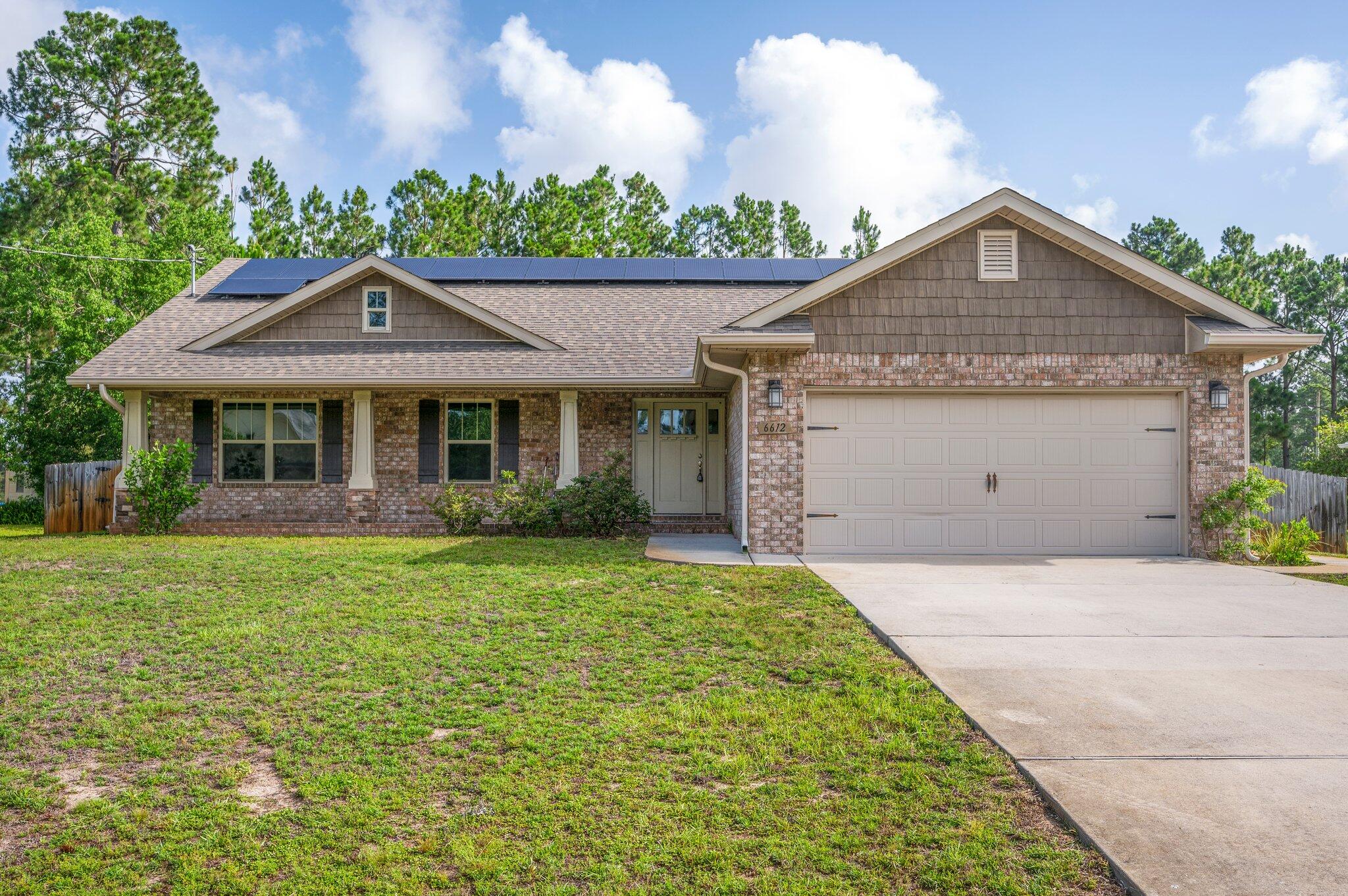 Large Half Acre Lot with newer open floor plan home in Holley By The Sea! This roomy home welcomes you into the living area and snuggles you in the bedroom made for royalty! This turn-key home has granite countertops in the kitchen and bathroom. The LVP floors are in the living area and carpet in the bedrooms. The HOA includes membership to Holley by the Sea's multi-million dollar 45 acre recreational center with 8 clay tennis courts, 3 swimming pools, full gym, aerobics, summer camp, lighted basketball courts, sauna & steam room, playground game room, community house on Santa Rosa Sound with playground, dock, access to the East Bay boat launch and many community events. Only minutes to the pristine white sugar sand beaches and emerald water of the Gulf of Mexico.