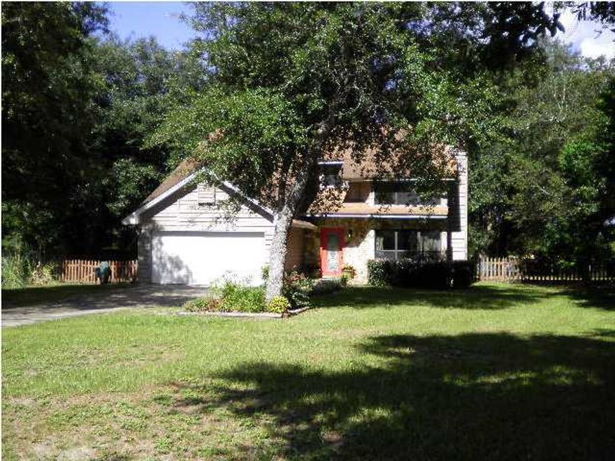 South of I-10! This 2 story, 3 bedroom/2.5 bath home with stone accents is located in Page Place Subdivision. Living room features a cathedral ceiling with lots of windows for a bright, open feeling. All appliances stay in the kitchen w/ a breakfast nook area! The dining area opens onto the outside deck. Upstairs you will find the 3 bedrooms, with two 8x11 decks accessed from the bedrooms where you can see the yard and trees. There is also a nice deck area across the rear of the home and fenced back yard. Call today to view this property!