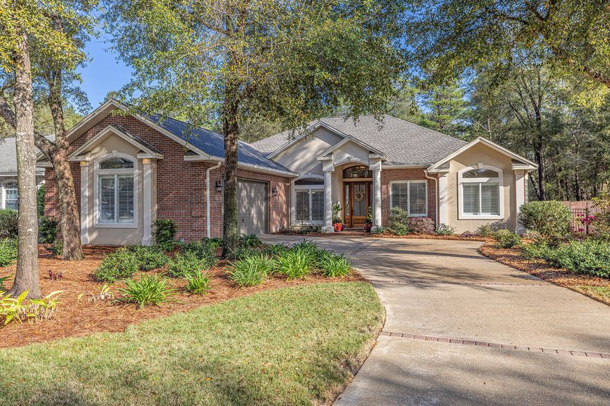 Beautiful, storage-rich Swift Creek custom built home offers 3 large bedrooms + flex/office with single level, circular flow split floor plan located in a desirable cul-de-sac location close to neighborhood amenities. Guests are welcomed through an elegant 8' mahogany front door with transom into the foyer and Great Room featuring 12' ceilings, entertainment built-ins, cozy gas FP with deep mantle, and double French doors opening to the private screened-in patio with views of natural wooded areas. Dinner guests will love the 14' double tray ceiling in the adjacent formal dining room. The gourmet kitchen boasts 42'' maple cabinetry w/pot drawers, granite countertops w/bar-height seating, stainless steel appliances, dual-fuel convection range, custom pantry, and adjacent breakfast area.