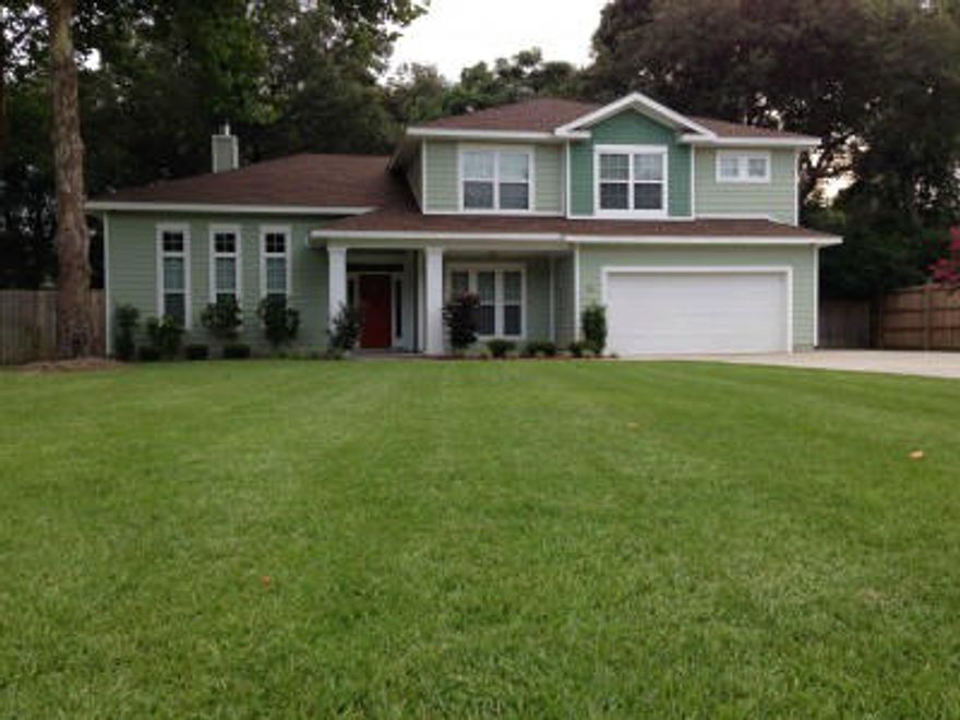 Newly Built Custom Executive Home designed by an award-winning builder nestled within the highly desirable Kenwood Neighborhood. Centrally located between Hurlburt and Eglin AFB with NO HOA fees and low county taxes. This home is loaded with luxurious features such as 20 ceramic tile throughout the main living areas, set on the diagonal, and 13' coffered and tray ceilings in the main living areas, which boast 7 crown molding and recessed lighting. The family room features a double-sided fireplace surrounded by built-in shelving with overhead arches and lighting, as well as prewiring for surround sound. The formal living room features a custom designed fireplace mantel that sits beautifully on the hand scraped dark wood premium laminate flooring, a combination that is sure to turn h