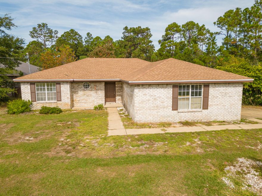 ALL OFFERS ARE WELCOME for this spacious property with a generous half -acre corner lot, in a highly sought after Holley By the Sea neighborhood, which offers incredible amenities to its members, such as community pools, tennis courts, beach house, gym facility, volleyballs and basketball courts, ball field, and an youth department.  This beautiful brick home was custom built by its first owner. Open and split floor plan, as well as an abundance of the natural light makes it feel larger than it is, offering an ample space for a family. It provides a blank canvas for your personal touch and creative vision, making it a perfect opportunity to make it your own. HUGE back yard is wide open to all kinds of possibilities to create an entertainment area of your dreams.