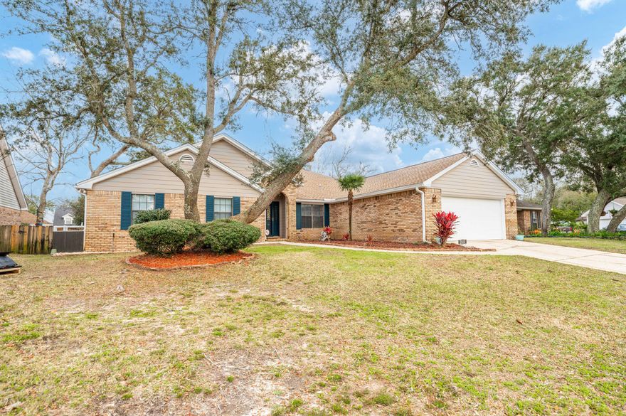 Four bedroom with in ground pool in Lake Lorraine EstatesThis brick and hardy board single-family home is exactly what you've been looking for. In the coveted neighborhood of Lake Lorraine Estates in Shalimar, with smooth wide streets, making it perfect for morning bike rides or evening walks. Updated with all of the bells and whistles, like crown molding, chair rails, and luxury vinyl floors, this home is move-in ready. Fresh paint through out home. All bedrooms have carpet flooring and ceiling fans. Step inside the tile foyer and immediately to your right is the formal dining room. Straight ahead you'll find a half-bath with granite and tile, as well as a living room with cathedral ceilings, carpet flooring and a wood-burning fireplace.