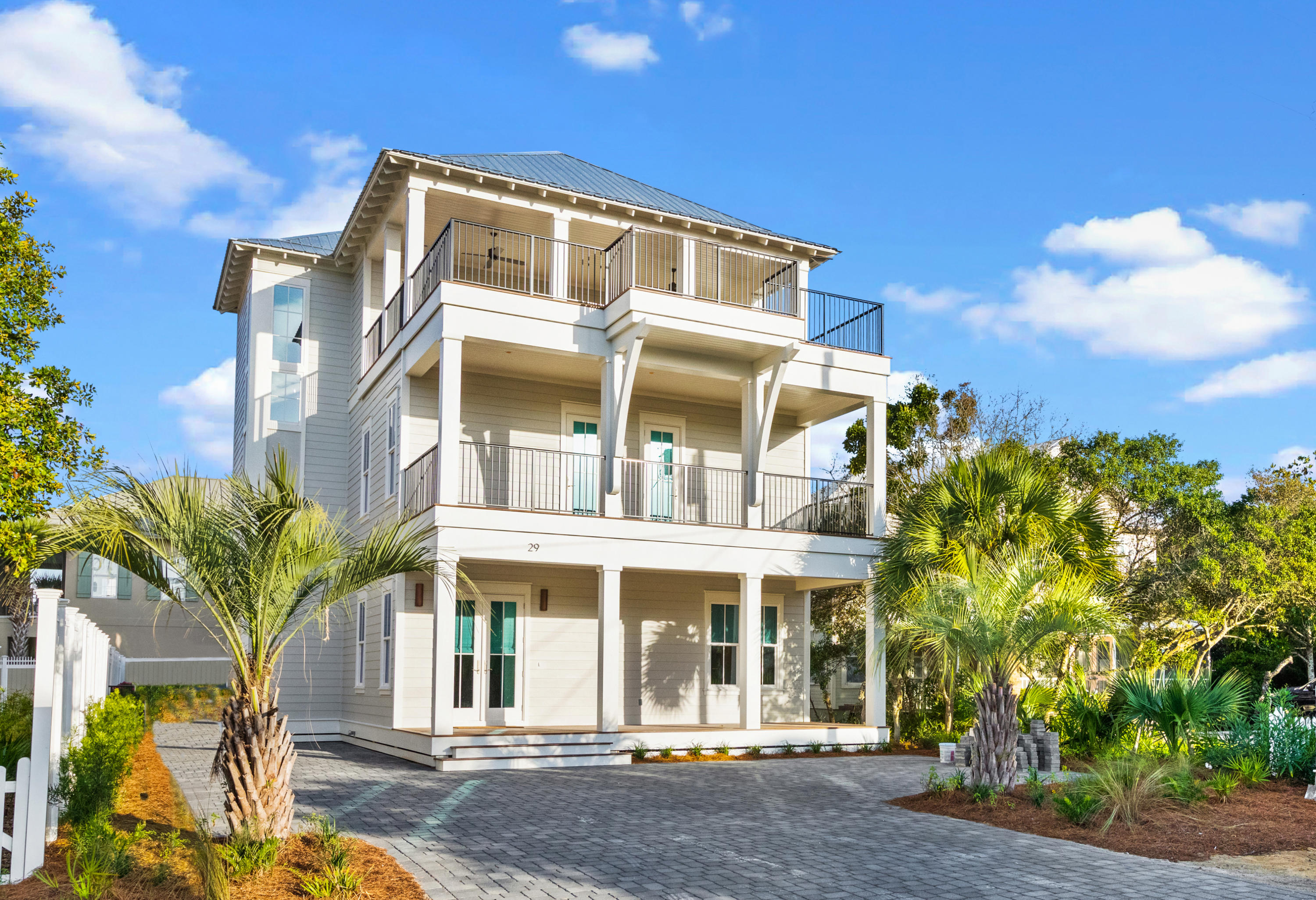 Coastal luxury at its best in this newly constructed retreat perfectly located in the heart of Seagrove Beach, less than a mile to Seaside and some of the most celebrated dining, shopping and entertainment options 30A has to offer. Best of all deeded beach access just a few steps away guarantee sandy toes in just minutes.Thoughtfully designed to take full advantage of the amazing gulf views enjoyed from both the east and the west, this highly desirable open floor plan is sure to impress with 5 bedrooms, 5 full baths, 3 half baths, multiple living and gathering spaces, private pool and some of the most amazing outdoor entertaining spaces offered along the Emerald Coast.