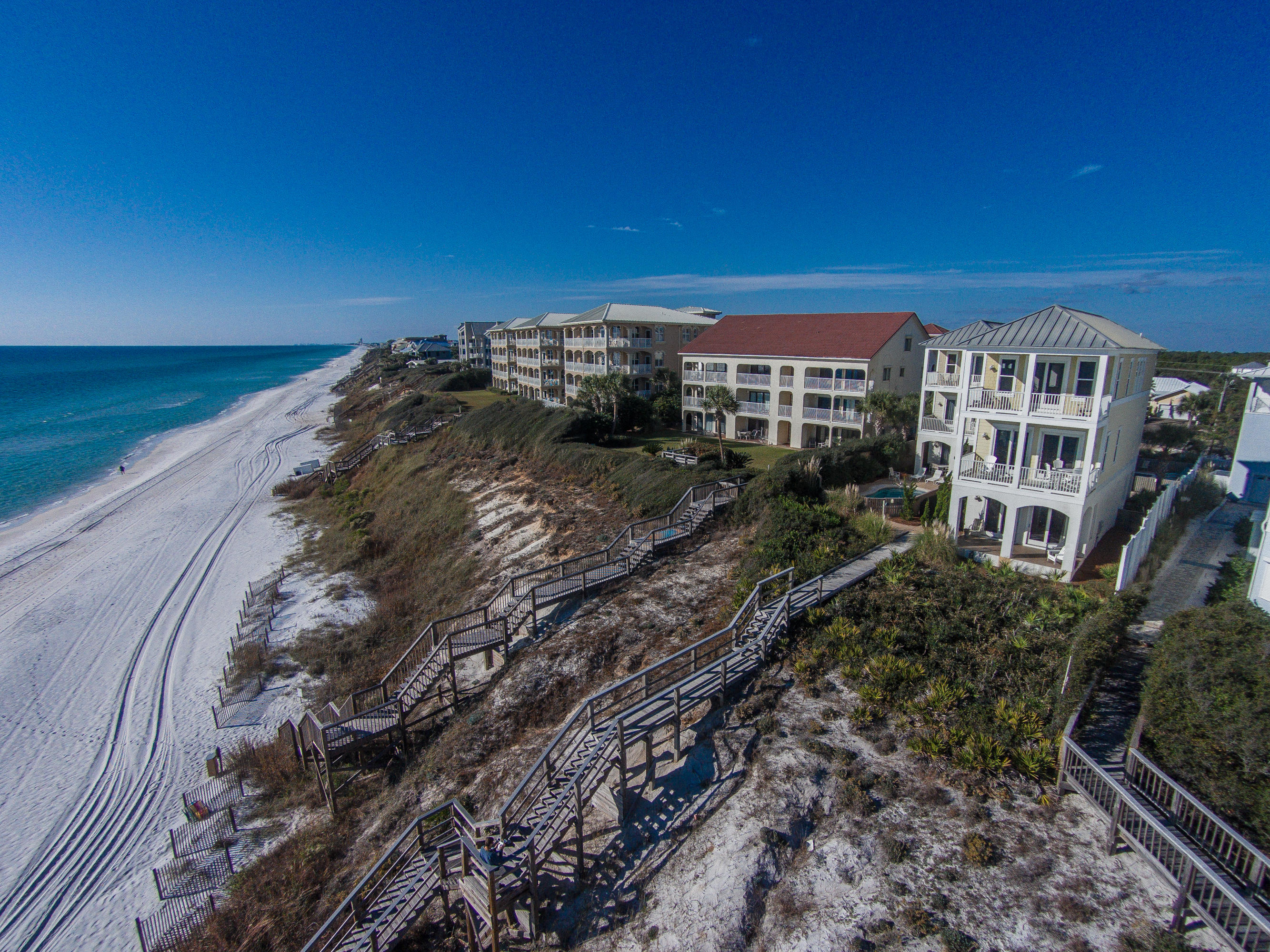 This five-bedroom Gulf-front beach house, with private pool, is primely located a half mile from Alys Beach, & at an exceptional value. With two huge gulf-front masters & three additional guest rooms, all rooms with private bathrooms, the interiors have been recently fully upgraded with Ethan Allen furniture, a clean coastal interior design. Each master has direct access to private, gulf-front decks & the large living area opens directly to the gulf-front deck, conveying impressive gulf-views from living, dining & kitchen areas, an open floor plan with lots of light. At a high elevation, this is the ideal family beach house, boasting grand gulf views from all levels. Will produce annual rental income of $140K-$150K.