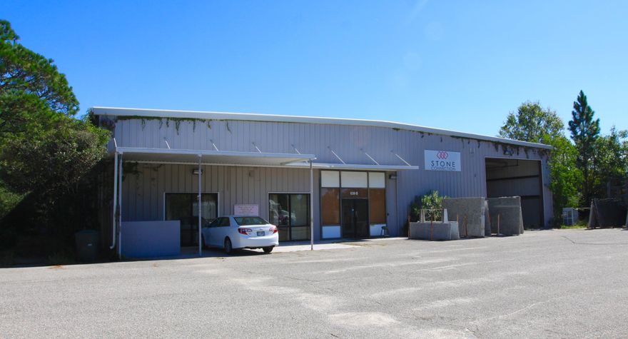 Available for lease- 15,000sf facility with loading docks in the Fort Walton Beach Commerce and Technology Park. This facility sits on 1.77 acres with .75 acres of paved yard and is entirely fenced. The building is comprised of 2000sf showroom with glass storefront, 1200sf of office/ storage and 11,800sf of warehouse. The warehouse is free-span with 18ft clear height, is fully sprinklered with 6 dock high doors and one 16x20ft ground high door.