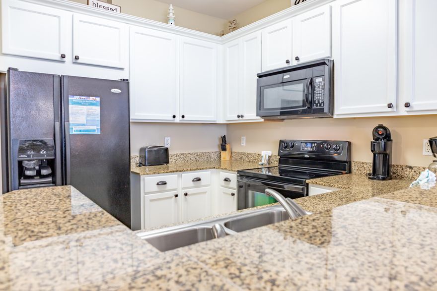 Looking for a turn-key, rental ready condo in the heart of Destin?  Look no further!! Check out this coastal 2 bedroom/2 bath, 6th floor unit at the desirable Palms of Destin Resort and Conference Center.  The balcony overlooks the tropical landscape around the pool and the Gulf of Mexico.  The kitchen features painted cabinets with hardware and granite counter tops. You will love the open living/kitchen concept and the upgraded luxury vinyl tile flooring throughout the living room and bedrooms! The master features a king size bed and bonus room has a built in custom bunk bed.  This unit sleeps 6 comfortably and is a perfect primary residence, 2nd home or investment.  Similar units gross $35k+ a year. HOA dues include all utilities including electricity!