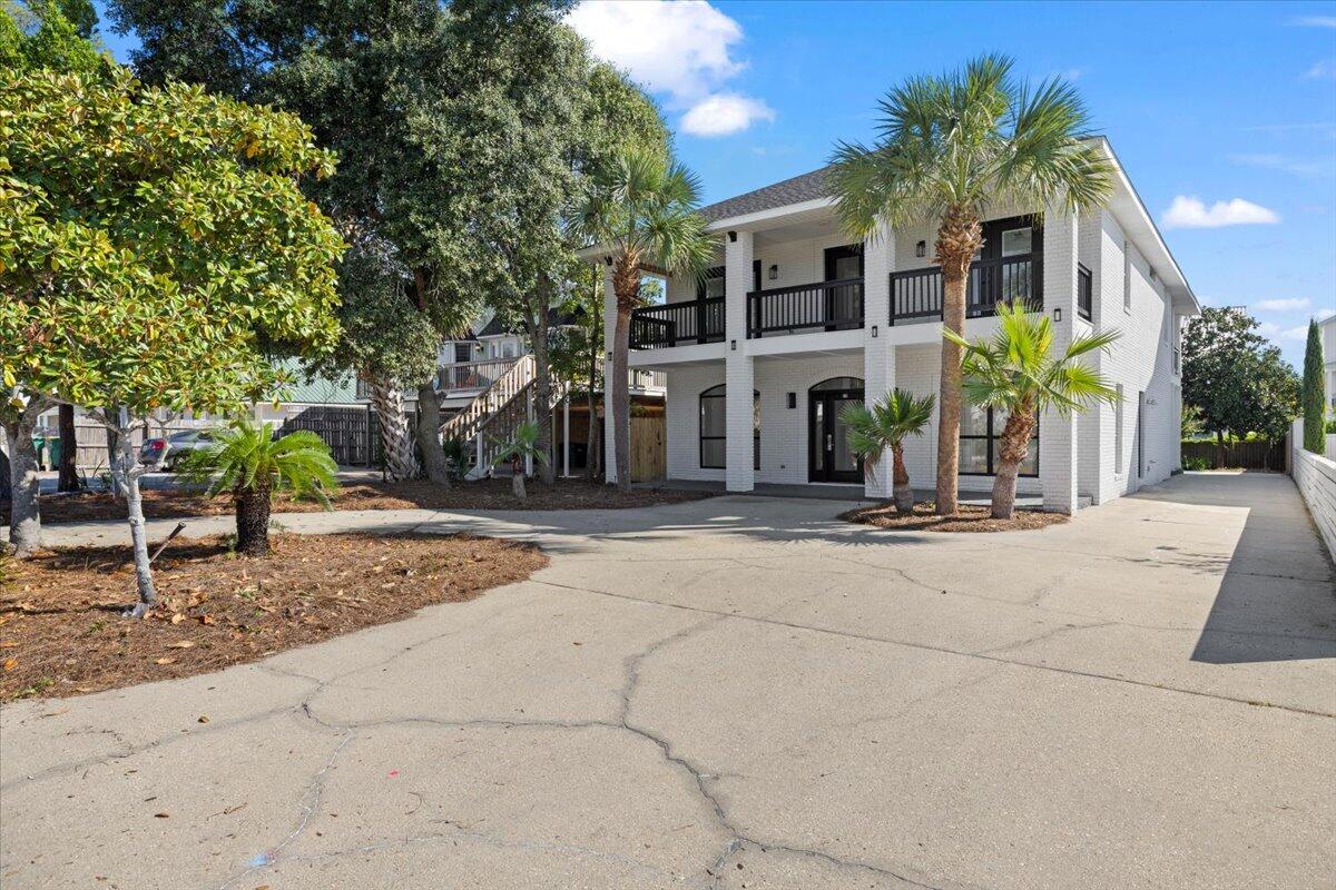 Discover coastal luxury in this fully renovated 6-bedroom, 3.5-bath home in Crystal Beach, Destin, FL. Designed for comfort and style, it features all-new flooring, elegant quartz countertops, and a spacious outdoor kitchen perfect for entertaining. The private pickleball court and new roof add extra appeal, making this home ideal for relaxation and recreation. Just a short walk from the beach, it's positioned for exceptional short-term rental potential, offering guests a premium experience close to the Gulf. This stunning, turnkey property is a rare find in a top rental location.