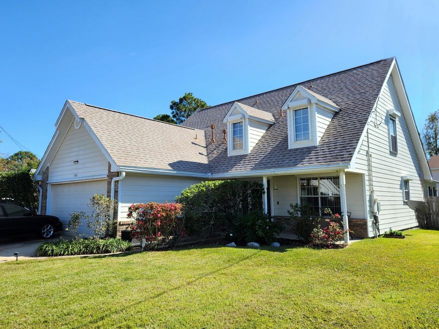 This charming home boasts a generous 1,890 SF and has been very well maintained. The master is conveniently located down stairs and offers an ensuite that just underwent $25k in renovations last month. Upstairs there's a loft area, 3 good sized rooms, and a full bath. A new roof was installed in 2021, ensuring peace of mind for years to come. Additionally, a 16x14 sunroom was thoughtfully added in 2018, providing a serene spot to relax in the cool shade. The ninja flooring in the sunroom was redone in June. As hurricane season approaches, rest assured knowing there's hurricane shutters on every window, front door, and garage door, ensuring the utmost safety and protection. A dual-fuel heat pump/air-conditioner was installed in 2019, allowing you to switch to gas heating when temperatures