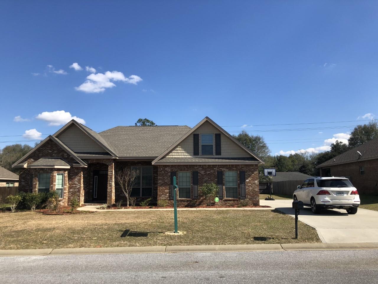 Beautiful 5 bedroom 2 bath ALL brick home. Owners have taken Great Pride in their home and it clearly shows. This very OPEN FLOOR PLAN so MANY UPGRADES.HARDWOOD FLOORING INSTALLED 2015 AND $10,000.00 WATER SYSTEM which includes AIR PURIFICATION SYSTEM/ REVERSE OSMOSIS WATER SYSTEM AND WATER CONDIONER FOR ENTIRE HOUSE. OTHER AMMENITIES such as granite countertops, arched openings, and tiled shower. This Kitchen boast custom cabinets and beautiful granite countertops with kitchen bar. It's open and A chef's dream. The master bedroom is also oversized with room for a sitting area. The Liberty Oaks neighborhood is conveniently located minutes from Eglin and Duke Field. This is an established neighborhood with all construction complete. The home is immaculate and obvious the ownerS ta