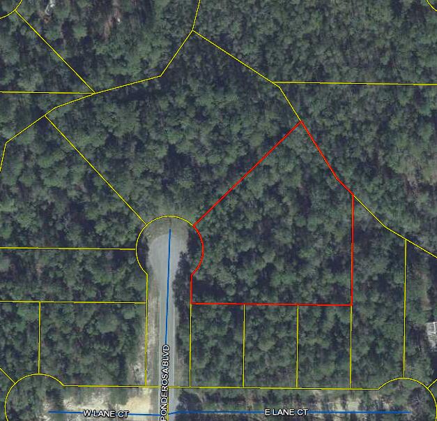 This is an excellent opportunity to purchase a large lot at the end of a quiet street. Measuring over 2/3 acre this lot is located at the end of a cul de sac featuring a paved road. Priced to sell. Call today!