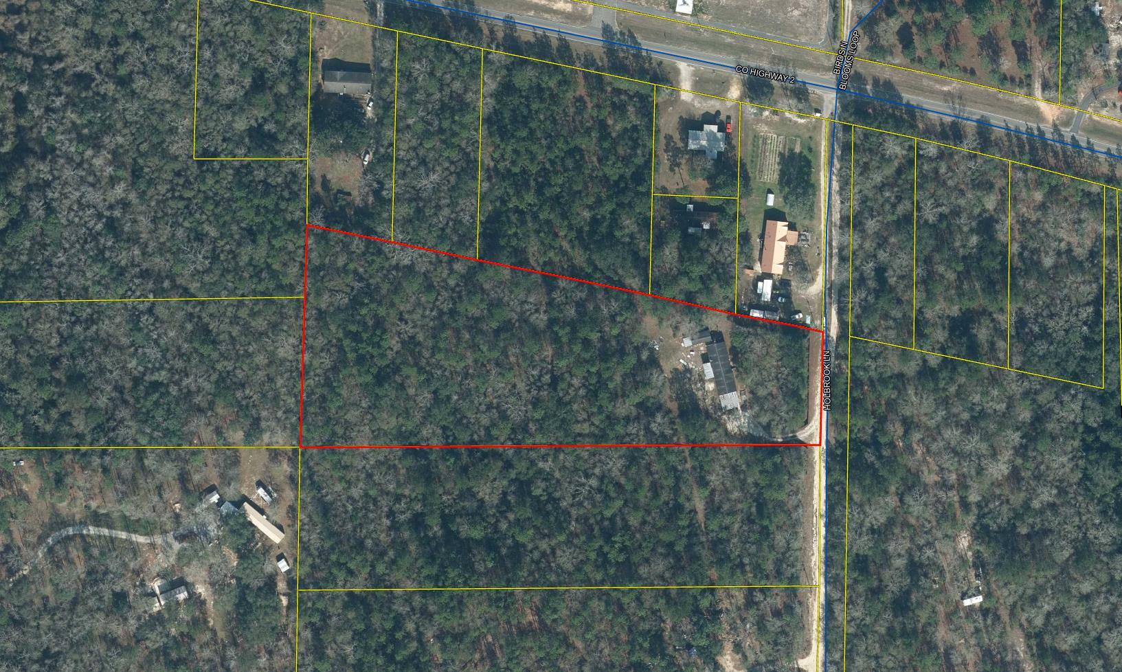 Great parcel of approximately 4.75 acres on a private road and completely in flood zone X. Parcel does have a 2,052 sf 4 bedroom and 2 bath manufactured home built in 1998 along with septic, water and power in place. With some cleaning and a little bit of electrical and plumbing work, the home is livable but given no value in this sale. Value is in the land and utilities in place. Only cash or financed land loans are being considered at this time.