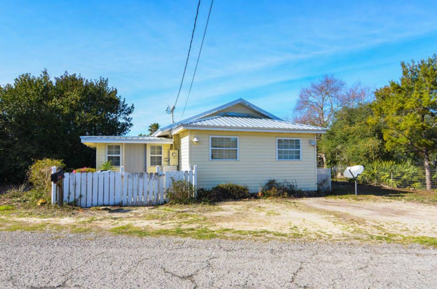 OH MY GOODNESS!!What a marvelous location!Only 1.5 blocks to Laguna Beach, this parcel goes street to street from Toledo Pl over to W Lakeshore.This great property consists of 2 dwellings-a 2 bedroom, 1 bath beach cottage on one end of the property resting on W Lakeshore and a 2 bedroom, 1 bath mobile home on the other end of the property resting on Toledo Pl.Both properties need your love and creativity.Super opportunity for 2 rental properties or a primary and rental or tear them both down and have an incredible building lot. There are several options Laguna Beach has a stretch of reserved beach with no condos or buildings It is a Golf cart friendly area.Laguna Beach is not just a place it's a lifestyle with a vibe of its own.This truly is a nice investment opportunity.Come check it out!