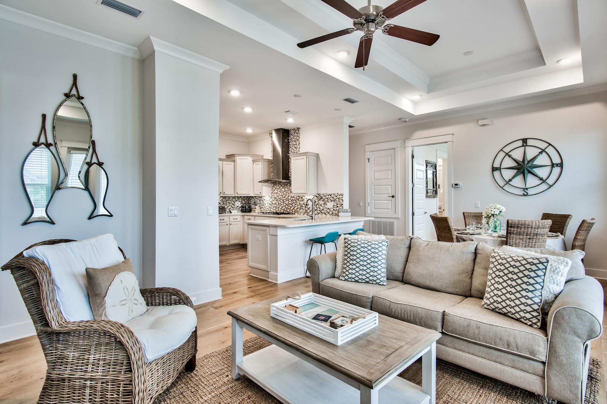 Location, Location, Location! This is a unique opportunity to own a rarely available & highly desired (2)-bedroom, (2)-bathroom & (1)-car garage ''CORNER LOT'' located directly across from the community pool in Prominence North. Strong rental history and projections of $40,000! Boasting $35,000+ of custom furniture and upgrades throughout. This unit is offered fully furnished and turn key ready for 2021! This immaculate unit is professionally decorated in clean & crisp neutral tones; perfectly complementing the open & airy space that leads to the covered balcony spanning the length of the unit - making for an abundance of natural light throughout the unit. Low monthly HOA of $300 per month which includes exterior insurance, beach shuttle, landscaping, pools, gym, security, and more