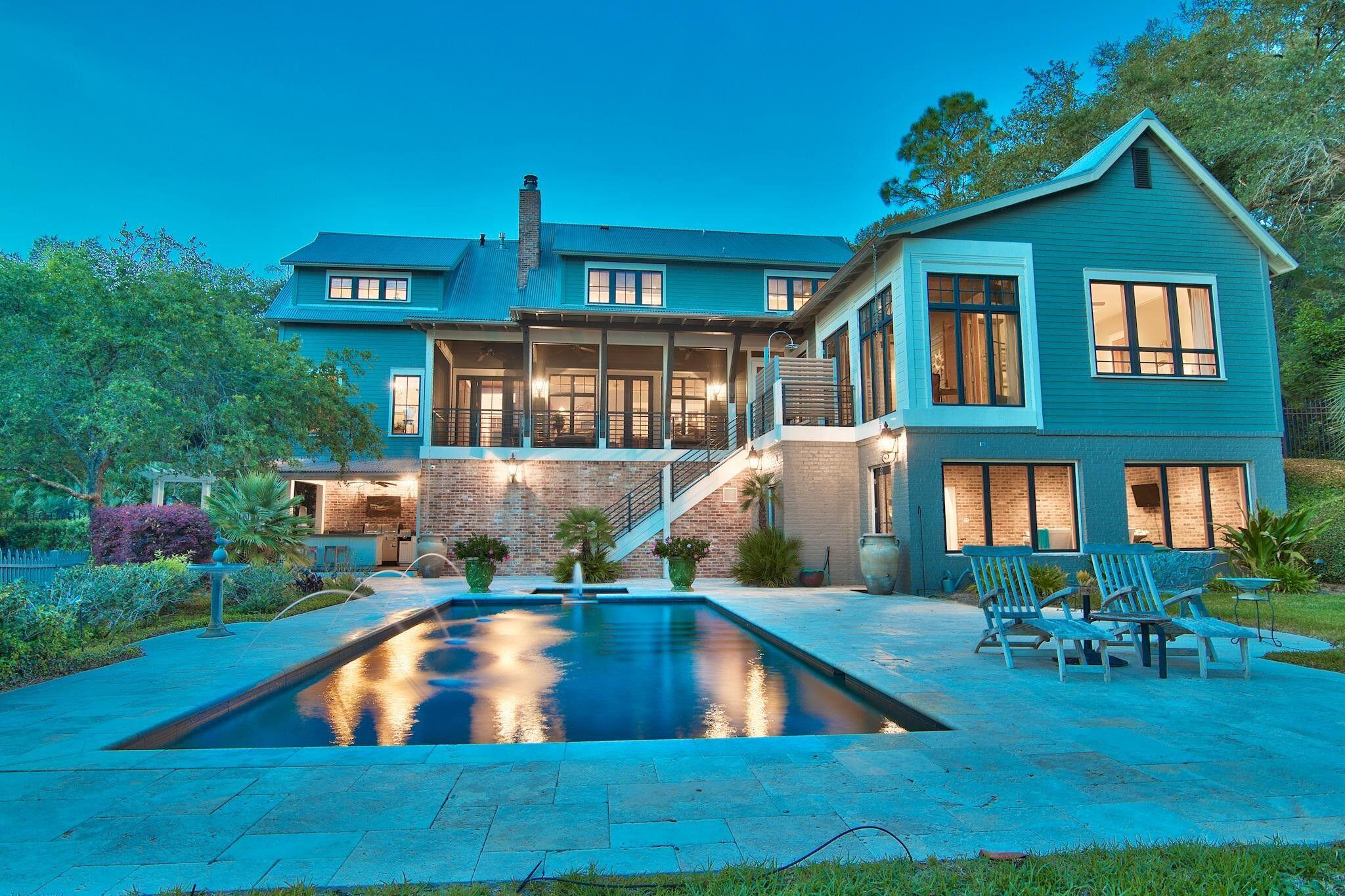 120 Bayou Dr., a private and secluded waterfront oasis located on one of the highest points in Niceville and offering a deepwater dock with boat and jet-ski lifts, as well as a private beach! Luxury meets Southern hospitality in this one-of-a-kind home where character and friendly, small-town charm collide. The home is a masterpiece of architecture by 30A based Matt Savoie. His careful planning and execution makes this extraordinary custom built home a true work of art. The elevation of the property resulted in a contemporary Arcadian style home, where a view of the expansive, deep water Rocky Bayou and the tree-lined shore of Rocky Bayou State Park is seen throughout. This house is positioned on a tiny loop, where traffic is at a minimum and serene privacy is found.