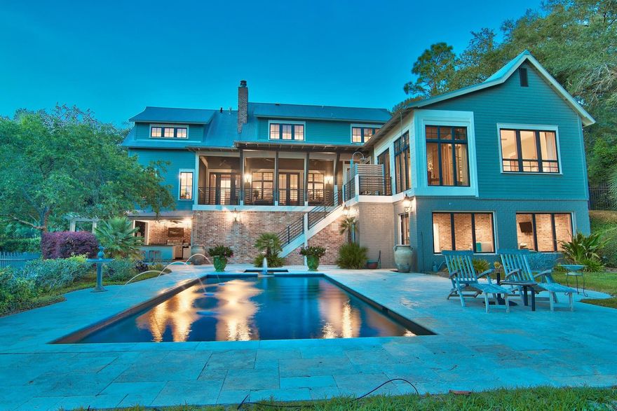 120 Bayou Dr., a private and secluded waterfront oasis located on one of the highest points in Niceville and offering a deepwater dock with boat and jet-ski lifts, as well as a private beach! Luxury meets Southern hospitality in this one-of-a-kind home where character and friendly, small-town charm collide. The home is a masterpiece of architecture by 30A based Matt Savoie. His careful planning and execution makes this extraordinary custom built home a true work of art. The elevation of the property resulted in a contemporary Arcadian style home, where a view of the expansive, deep water Rocky Bayou and the tree-lined shore of Rocky Bayou State Park is seen throughout. This house is positioned on a tiny loop, where traffic is at a minimum and serene privacy is found.