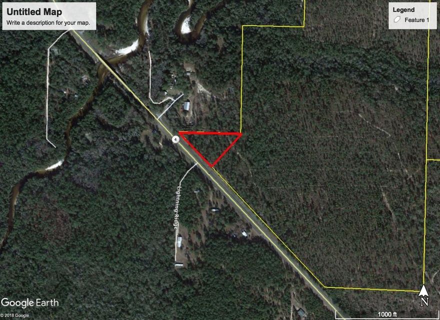 Wow!!! The ultimate country get away and awesome location for a home-site. Walk to Blackwater River! Near Blackwater state forest . Less than an hour from the Beautiful panhandle beaches. Come check it out today.Subject to County Approval of lot Split.