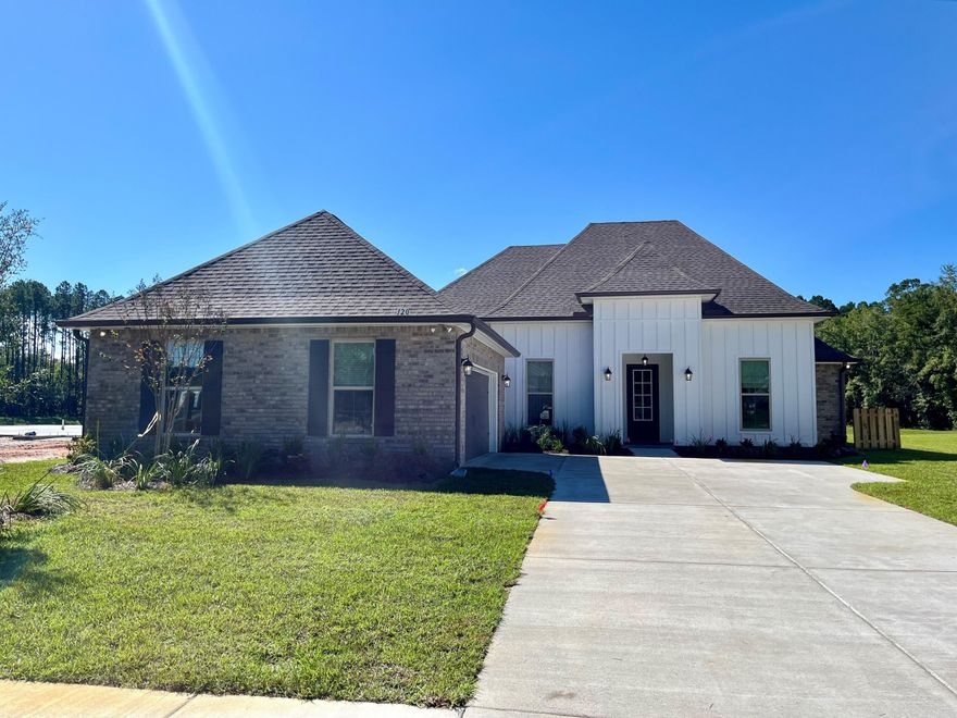 The RENOIR IV H in Starburst at Hammock Bay community offers a 4 bedroom, 3 full bathroom, open design with a breakfast area and flex space. Upgrades added (list attached).  Features: double vanity, garden tub, separate custom tiled shower, and walk-in closet in master suite, double vanity in 2nd bath, walk-in closet in all other bedrooms, kitchen island, walk-in pantry, boot bench and drop zone in mudroom, covered rear patio, recessed lighting, crown molding, framed mirrors in all bathrooms, smart connect Wi-Fi thermostat, smoke/carbon monoxide detectors, landscaping package, architectural 30-year shingles, flood lights, and more!Energy Efficient Features: water heater, electric kitchen appliance package, vinyl low E windows, and more! Energy Star Partner.