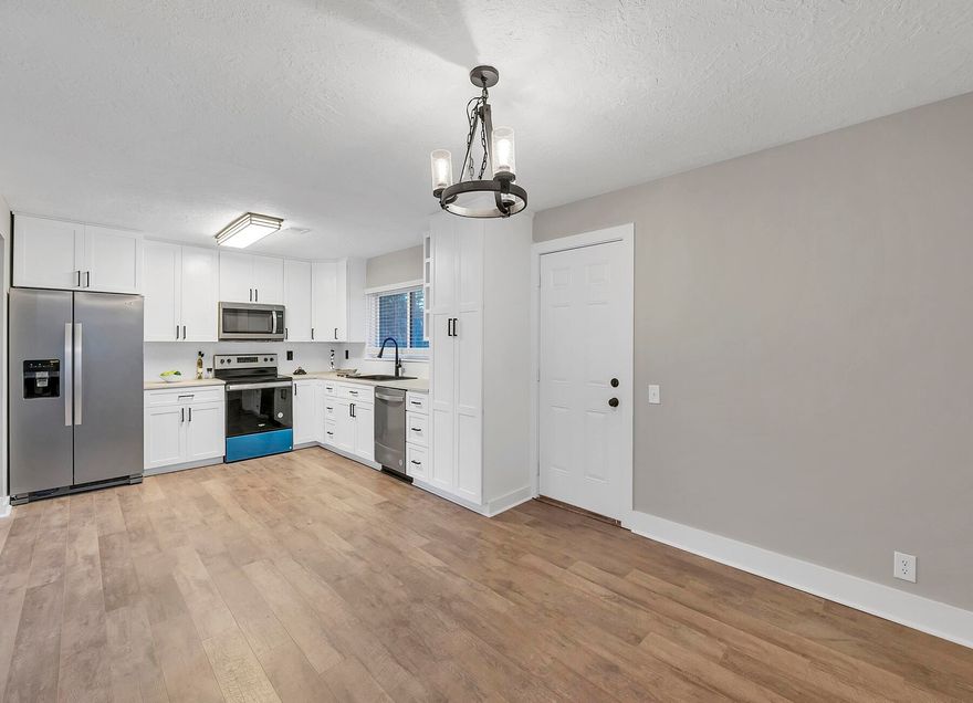 Super remodeled home--Va/Fha qualified!! 100% Updated - Completely renovated and updated 3 bedroom and 2 bath brick home only a few blocks from the school in Laurel Hill. Updated with new Kitchen, baths updated a few years ago, new floors, new paint, new fans and lights, new carpets bedrooms. 2013 approx. age of METAL ROOF Painted carbonized Bronze, 2016 AC, 2023 HOT WATER HEATER..