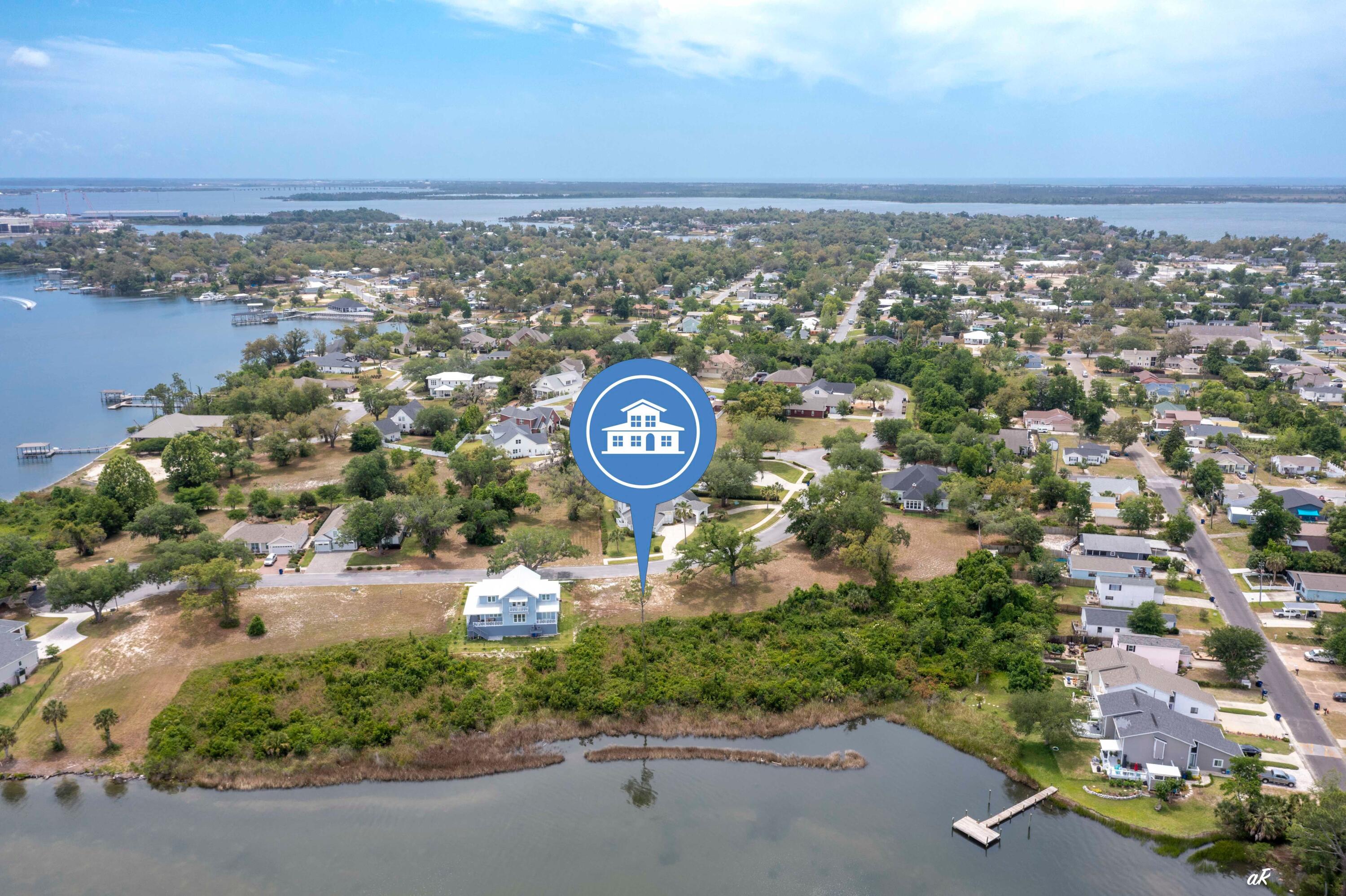 * 80 FEET OF WATERFRONT *Build your WATERFRONT dream home on Watson Bayou offering unobstructed access to Shell Island, the Gulf, and St Andrews Bay. Located on a quiet cul-d-sac street, this waterfront lot is convenient to hospitals, downtown restaurants & shops, schools, and Tyndall Airforce Base. The buildable portion of this lot is located in flood zone X.. DEP has already approved a deck/walkway through the conservation easement to the bayou. This will allow you to access your future dock and boathouse.Survey on file