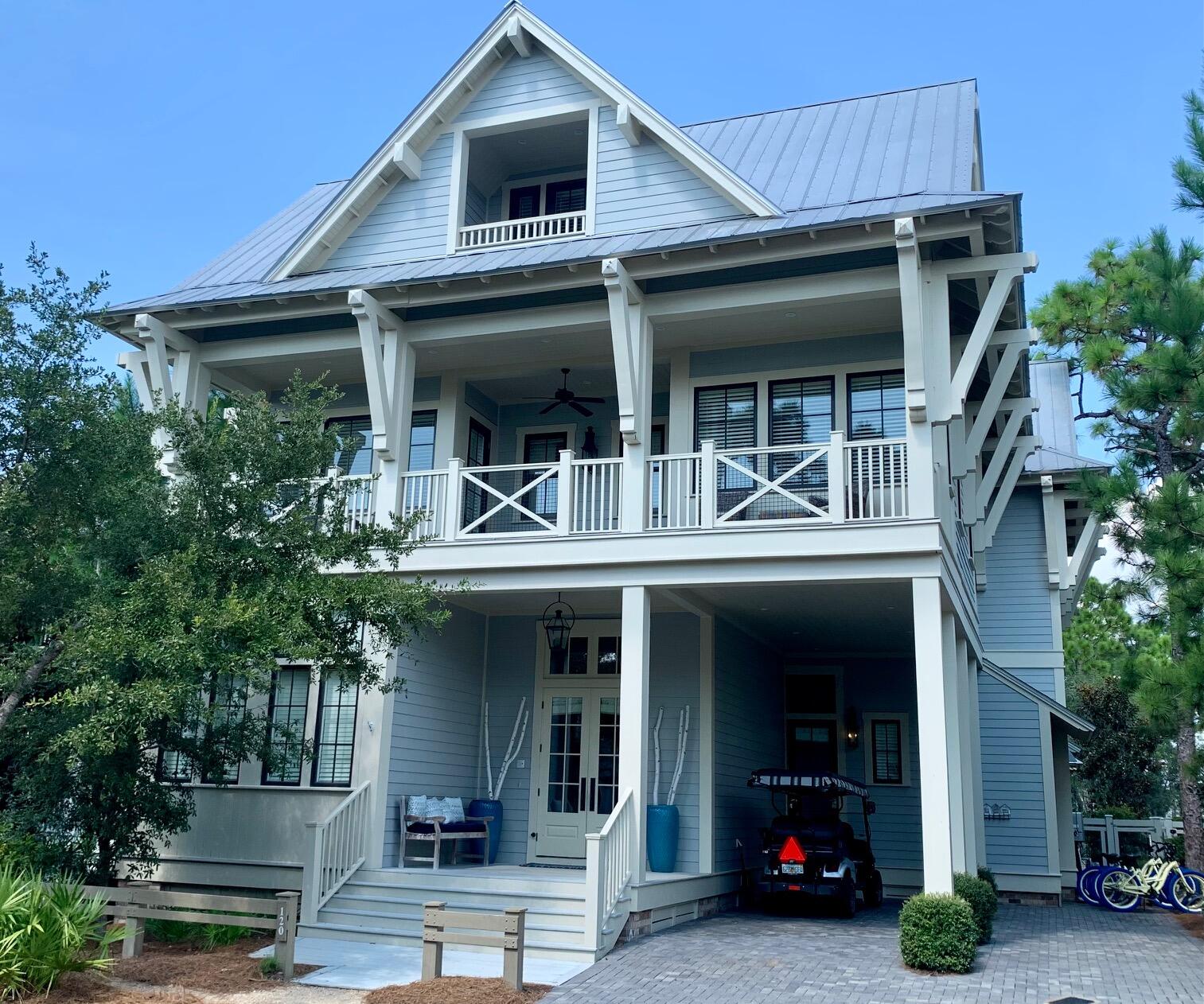 This gorgeous WaterColor home has standout features including inviting brick archways, 14' first floor ceilings, white oak hardwood floors, an elevator and an outdoor living area complete with a summer kitchen and a beautiful brick fireplace. Designed by T.S. Adams Studio, this home offers over 4,000 sq.ft. of living space, 1,350 sq. ft. of porch space, 5 bedrooms, 2 bunk rooms and 7.5 bathrooms. Perfect for entertaining, the first floor has a spacious great room, lovely dining area  and gourmet kitchen with top of the line appliances and an expansive island. A secondary master suite with private bathroom is also located on the 1st floor. The exquisite second floor master suite offers a private sitting area, private porch and luxurious master bathroom (with its own en-suite washer/dryer).