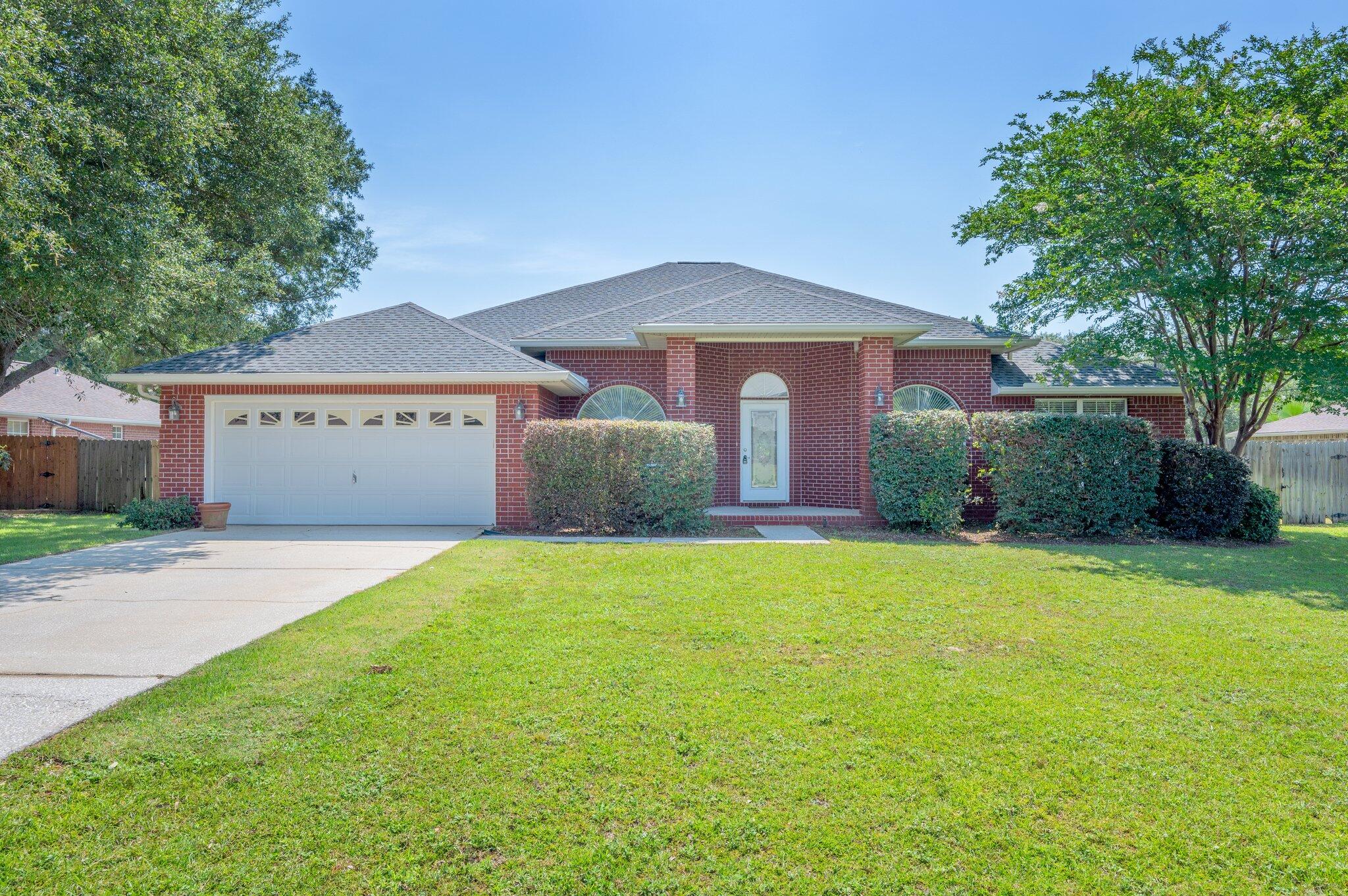 Welcome to this beautiful 4 bedroom, 3 bathroom home located in Navarre. This spacious house features an open and bright layout, perfect for entertaining guests or relaxing with family. Great gourmet kitchen is equipped with a double oven, ideal for cooking delicious meals and loads of counter space! The garden tub in the bathroom provides a luxurious spot to unwind after a long day. With walk-in closets in each bedroom, there is plenty of storage space for all your belongings. HOA fees are paid by owner. This fine home is conveniently located for easy access to beaches, shopping and great restaurants as well as Pensacola and Ft. Walton Beach! Don't miss out on the opportunity to make this house your new home!