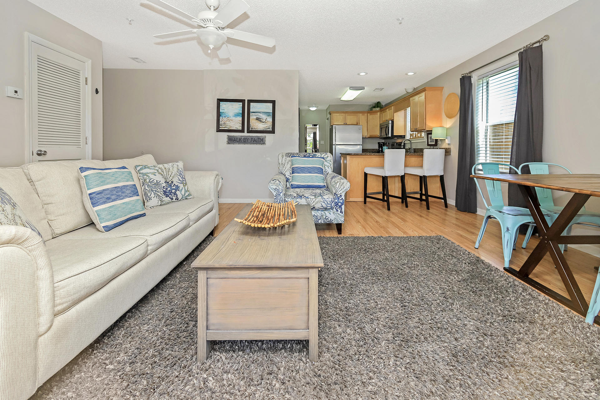 Don't miss this opportunity to own a 2BR/2BA, 936SF unit at St. Martin Beachwalk Villas. The living space & bedrooms feature hardwood floors. The kitchen features granite countertops, wood cabinetry, stainless steel appliances & breakfast bar. Unit has been updated with new washer/dryer and water heater. Closest unit to the deeded beach access & located on the first floor so no stairs to deal with. Will be sold with furnishings. St Martin Amenities include, pool, grill area & club house. Condo is centrally located to shopping and attractions for the kids. GREAT INVESTMENT!