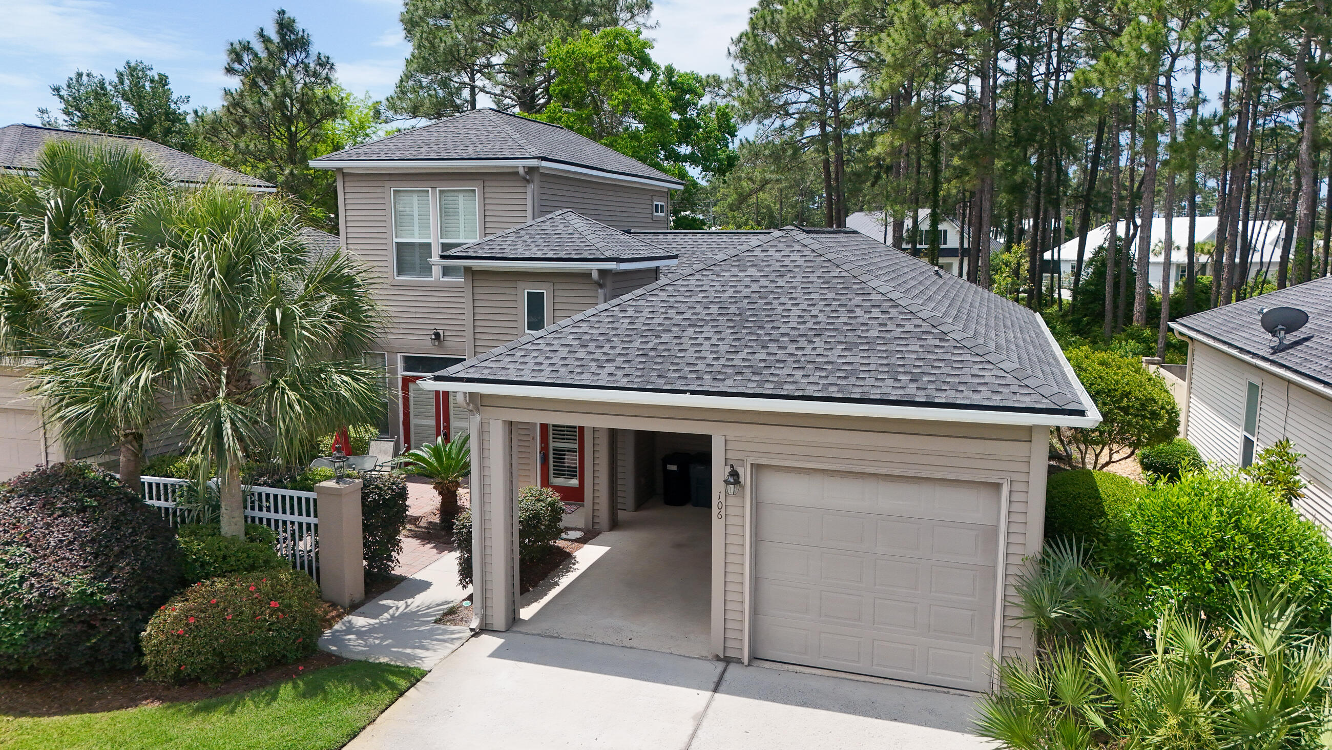 A Great Location!! This furnished home is in a quiet, gated and well sought out neighborhood backed up to a preserve. A short walk to the beach and 1 block from the Santa Rosa Golf Course. Plantation shutters throughout entire home. There is a swimming pool and cabana within the community. The houses are attached two by two with a carport and garage attached to each unit. Parking for two cars and golf cart. Golf cart conveys with property. There is a front and back courtyard for relaxing and privacy. This community does not have short term rentals.
