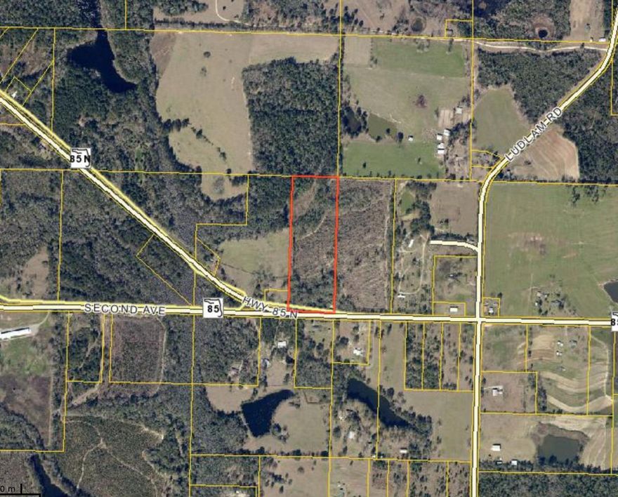 Level 12 Acres of Land 1.75 miles North, just outside of Laurel Hill. There is an existing structure on the East property line that is given no value. Please verify zoning, school zones, and other information that is important to you.