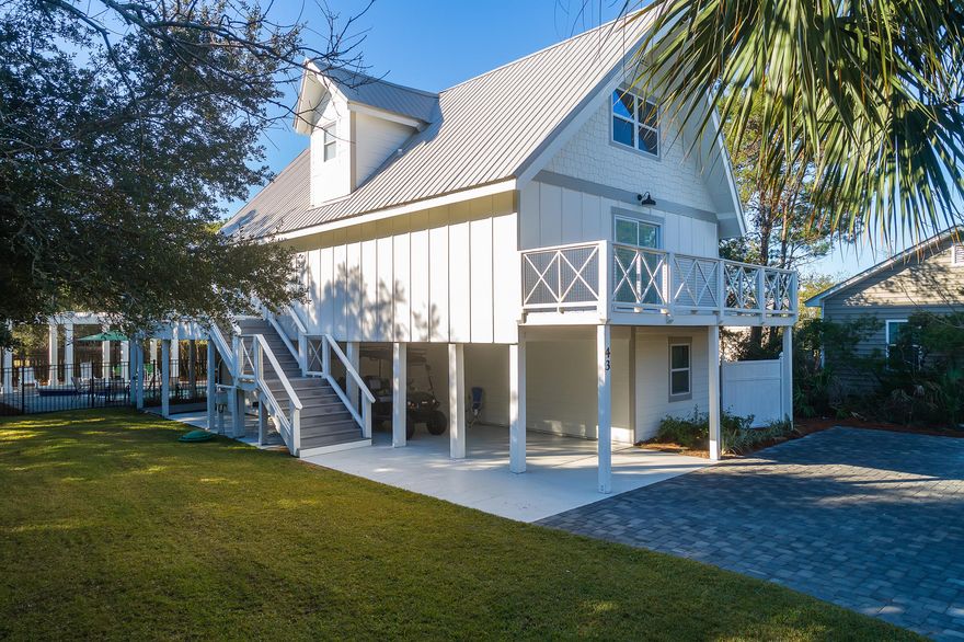 Under contract with a 72 hour Kick-out Clause. COMPLETELY REMODELED BEACH HOUSE WITH SEPARATE APARTMENT! There is not one area of the home that hasn't been improved in the last year including: new roof, windows and doors, siding, paver driveway and pool deck, appliances, interior and exterior paint, furnishings and more! This charming home is located 2 blocks from the beach and on a quiet cul-de-sac with room to add a garage/carriage house. 2019 rental actuals were over $60,000, which does not include 120 nights of owner usage. 2020 has more than $51,000 in rentals on the books with projections over $92,000 with minimal owner usage. The first floor consists of a self-contained apartment with full kitchen.