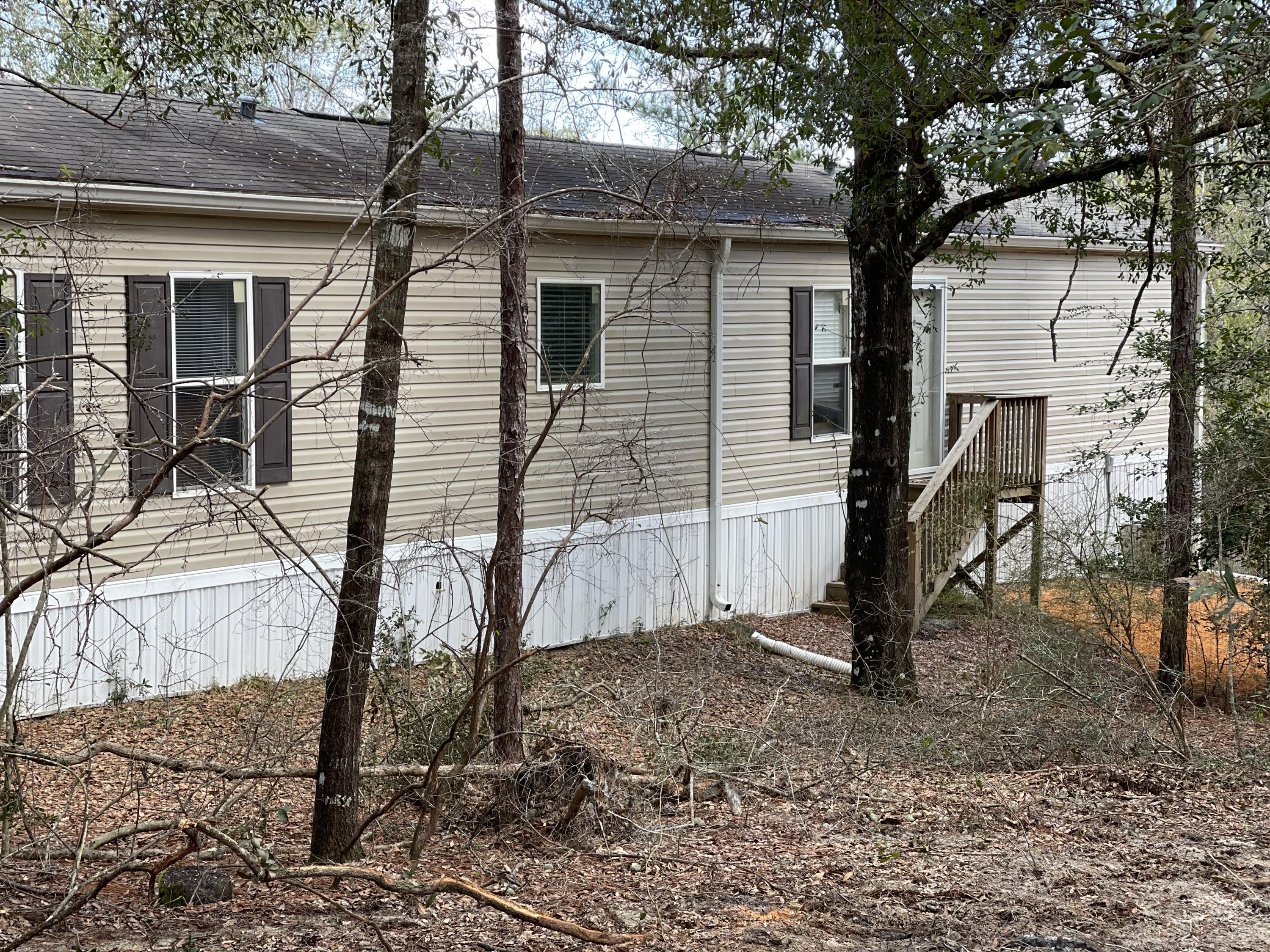Ready for a quiet, secluded piece of Florida paradise? You have found it! This manufactured home was built in 2014 and sits on just over an Acre of Property! It features a sprawling kitchen Island and a beautiful open concept! The master bathroom has a garden tub, separate shower, walk in closet and double sinks! Do not miss out on this great home! Call today!