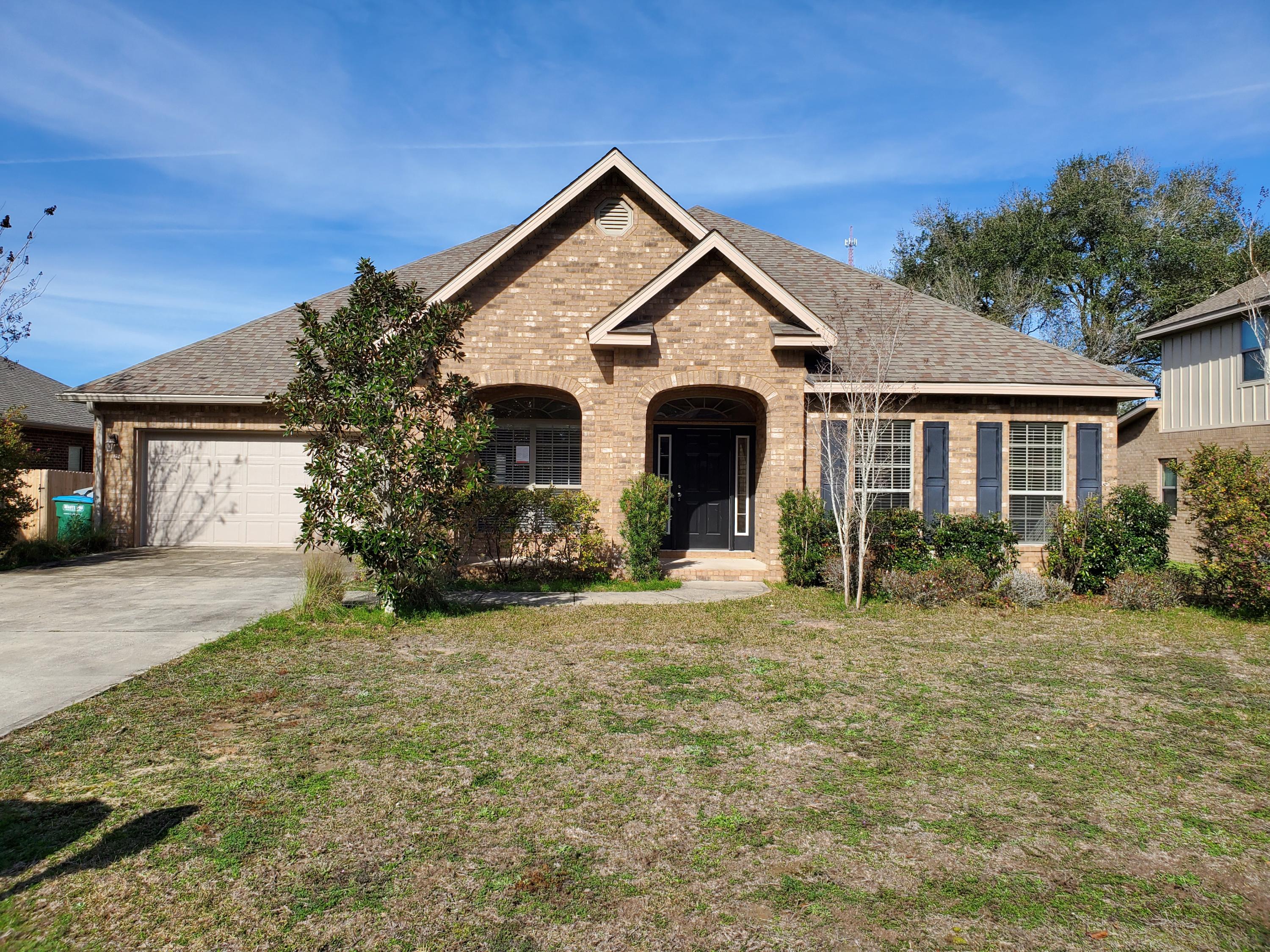 Welcome Home! BEAUTIFUL 5 bedroom 3 bath home for sale in Crestview. This property boasts almost 3500 square feet of living space and features formal living, formal dining room, a HUGE foyer/entry, tall trey ceilings, open living/dining/kitchen combo, and huge island in the kitchen. Granite countertops, stainless steel appliances, walk-in pantry, and more! 2 car garage. Split bedroom layout for added privacy. Giant master bedroom with double vanity, walk-in closet, garden tub, and separate shower. Large back covered patio and fenced-in back yard. This property is vacant and move-in ready!