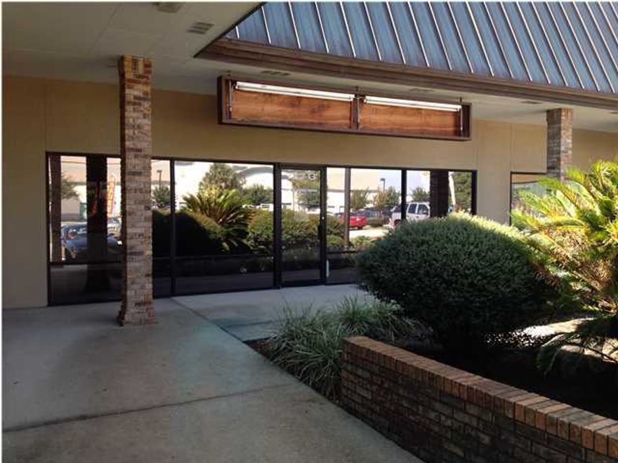 FABULOUS LOCATION!!! In the heart of the activity, this 1800sf unit boasts 3 offices with doors, 1 open computer style room, 1 conference room, 1 kitchen and 1 bath.  Great visibility!!  Located one block South of Sam's and Wal Mart, this well maintained center has a well-rounded group of commercial customers that will help to enhance any business.