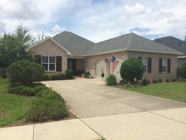 Fabulous 'like new'' construction without the noise and mess of building nearby. This Huff Homes former model home is located in the highly desired community of The Preserve At Swift Creek. All brick featuring 8' interior doors, trim details, granite countertops, hardwood floors, silent close cabinets in kitchen and baths, designer tile, stainless steel appliances, recessed lighting, wired for surround sound and security system, screened-in back porch, fully fenced yard, sprinkler system using reclaimed water so water bills are SMALL. Remotely controlled climate/thermostat-control from any computer, anywhere. Centrally located in Niceville's Rocky Bayou area close to Eglin Air Force Base, Duke Field, Hwy 85, Airport, 17 minutes to Crestview AND only 15 minutes to the beaches of Destin!