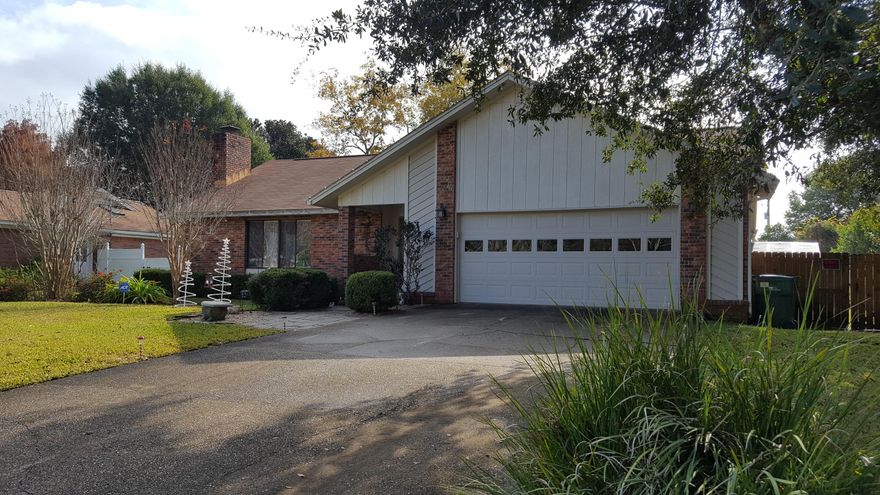 This lovely 4 bedroom , 3 bath home sits on a large .25 acre lot with a fenced back yard. The interior has large family room with fireplace, hardwood floors and vaulted ceiling. The kitchen has lovely updated white shaker style cabinets with granite counters , tile backsplash,a kitchen island and stainless appliances.Off the kitchen there is a great additional space which would make a great playroom, office gym or living area. There are 2 master bedrooms with attached bathrooms and 2 additional bedrooms. The backyard is lovely with a patio and gazebo. This home is conveniently located in central Destin, with the beaches, shopping and schools nearby. Pets considered with owner approval and a non refundable pet fee. No smoking. Tenant occupied , will require notice to show.