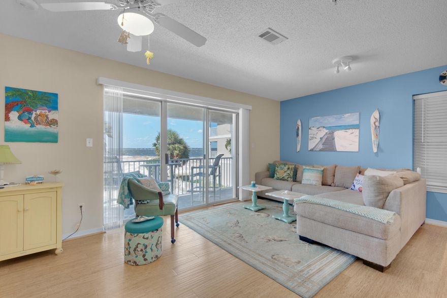 Welcome to Sunset Harbour Villas 223 just steps from the beach!  Walk, bike or drive to the public beach access less than 1/2 mile away and enjoy the beautiful white sandy beaches.   Vibrant colors inside and beautiful scenery lift your spirits as soon as you arrive!  Live the beach life in this rental ready cozy 3 bedroom and 2 bath condominium home that comfortably sleeps 6. Enjoy your turn key, fully furnished residence as a second home or rental.  You will appreciate the value added with storm shutters.  The kitchen was updated 3 years ago with quartz countertops and stainless appliances.  Entertaining family and friends in the bright and airy open floor plan with bamboo flooring is a breeze.  Enjoy mornings on your balcony sipping coffee, overlooking a pool and soaking in views of the sound.  Two sliding glass doors let onto the balcony which is ideal for capturing sunsets.  The laundry room includes a stackable washer and dryer.  After a day at the beach, you will enjoy taking a dip in the beautiful community pool with nearby grill.  Owner's also have access to a clubhouse with kitchen, fireplace and gathering space.  Great rental potential in the range of $38,000-$43,000.
For the adventurous, enjoy excursions as Navarre Beach is nestled perfectly between Destin and Pensacola for brief pleasure trips to discover some of the finest in casual and fine dining, shopping and entertainment on the Emerald Coast. The Navarre Beach Pier, the longest pier on the Gulf coast, is nearby where you can enjoy fishing, boat watching, or gazing at the views of the Gulf Islands National Seashore. Eight miles of undeveloped pristine shoreline beckon you to walk the beach and we invite you to learn more about the exciting opportunity to live the Navarre Beach lifestyle in this fabulous location.
