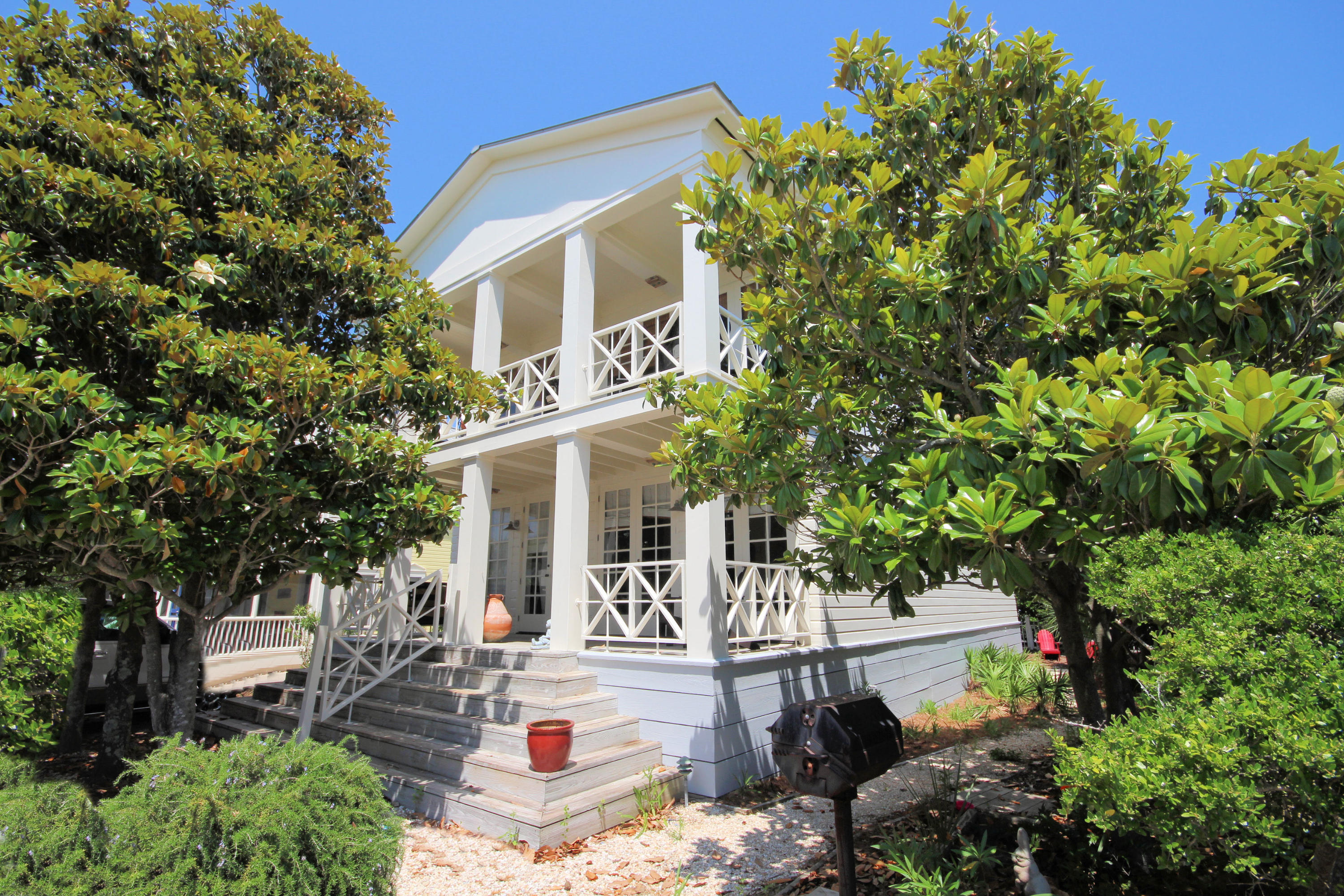 Main house: +- 2,362 sq. ft. Three bedrooms, 2 -1/2 baths Guest cottage: +-470 sq. ft. One bedroom, one bathThis elegant, classically inspired pied--terre will simply amaze you! Situateddirectly across the street from the beach, the location couldn't be better. From the first approach of this grand home, the distinguished architecture carries through to the interior with arched passageways, vaulted and cross-vaulted ceilings, right on to the classical architrave supported by Doric columns. To maximize on incredible views, this beautiful home offers kitchen, living and dining on the second level. The over-sized master suite, also on the second floor, is absolutely scrumptious!