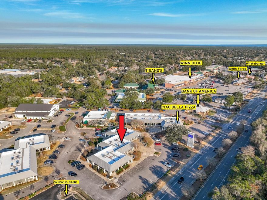 HIGH VISIBILITY & EASY ACCESSIBILITY.  Prime CLASS A office space in popular Merchant's Walk business complex in the  heart of Bluewater Bay. Located in one of the busiest & most popular complexes in BWB with 50 direct frontage feet on Hwy 20, this 3000 SF commercial space provides maximum drive-by traffic & visibility. Offering 5 strategically placed entrances: 2 in the front, 1 on each side and one on the back, this commercial space offers opportunity for one large business or the subdivision & accommodation of several businesses.
