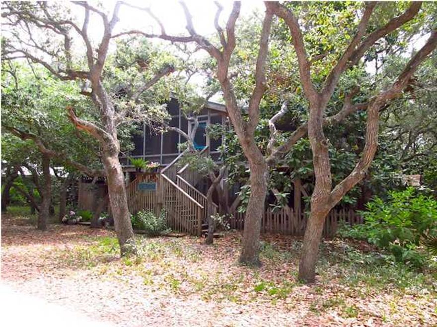 ''The Tree House'' is a spacious rustic home gently nestled among 100-year old Oak trees in the heart of Old Seagrove Beach. It's situated on a 100 x 100 lot and is only three short blocks to Seaside and one block from Hwy 30A and the Gulf of Mexico. This home has been recently updated throughout with a new kitchen, all new bathrooms, and new 3rd floor tower. And speaking of the 3rd floor tower...there is no other view like it in the heart of Seagrove. 360-degree views as far as the eye can see! A huge screened-in wrap around porch greets you as you make your way to the open living and dining area. Cathedral ceilings, with exposed beams, and a fireplace make this living area especially comfortable. The kitchen boasts brand new granite countertops, appliances and cabinets.