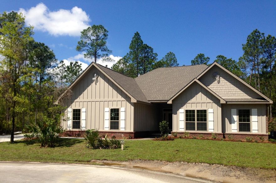 NEW CONSTRUCTION IN A NEW COMMUNITY JUST 5 MINUTES FROM GRAYTON BEACH! Land designated as state forest surrounds Point Washington Estates. The community consists of only 21 homes sites that range from .58 acres to 1 acre. Each site is unique and home to large mature Oaks, Magnolias, and Pines. Homes sites like these are rare in the area! This home is on a cul-de-sac and backs up to nature preservation land, so no one will ever be able to build behind you. Beauty and privacy! Close to schools, shopping and the beaches of 30A. The price includes granite counters, 20 x 20 porcelain tile, tile shower, hardwood floors, stainless steel appliances, covered patio, side entry 2 car garage.