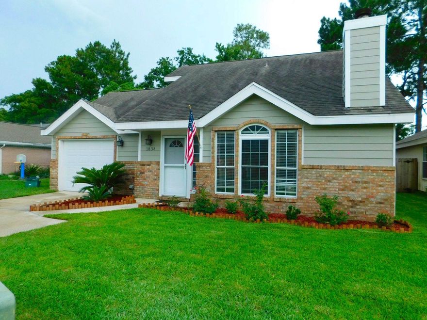 DON'T MISS OUT on this beautiful updated home located close to both Eglin and Hurlbert. Home has just been freshly painted and has many recent updates. New laminite flooring (2015), new HARDY BOARD siding (2017), 2 new french double doors (2017), remodeled master bath (2017), remodeled guest bath (2016), and some new windows (2014). This home has a first floor master bedroom with a master bath featuring a jetted whirlpool tub, french doors that lead to a covered patio, and 3 closets!! Living room has a fire place, ceiling fan with a remote, and leads to eat-in kitchen with stainless steal appliances and french double doors leading to covered patio. Up stairs is 2 bedrooms with connecting bath. One bedroom has a large walk-in closet that has accessible attic space for extra home storage.