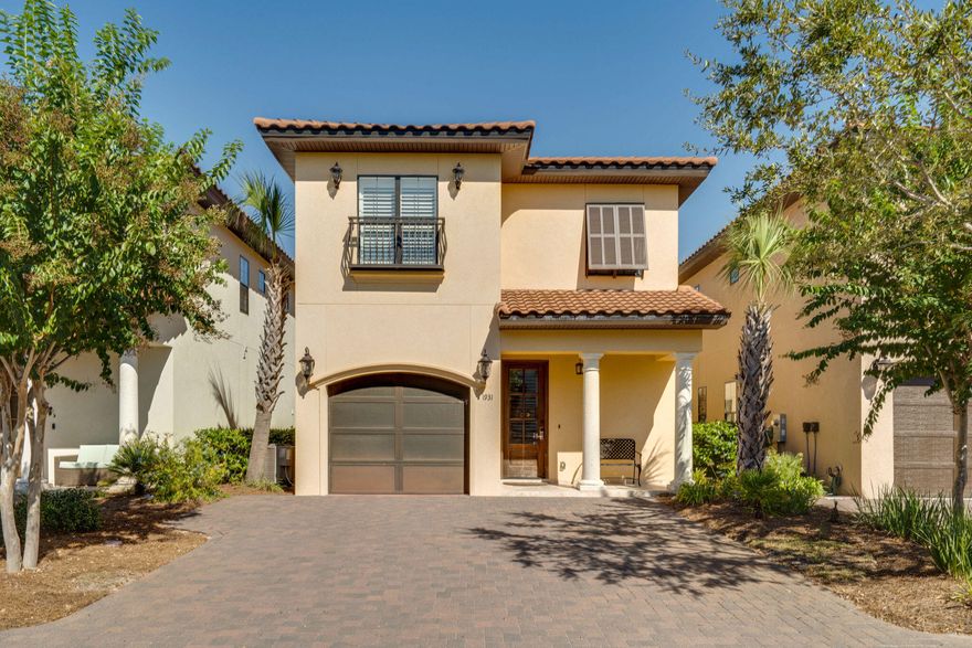 This Mediterranean home with single car garage enjoys tranquil views of the fountain on the central water feature of Villa Lago from its 1st & second floor open patio and balcony. Tuscan style interior with ceramic tile flowing throughout the main level. The kitchen has granite counter tops with breakfast bar, a copper double sink, and stainless steel appliances. An office/optional 4th bedroom and full bath complete the first floor. The 2nd level features wood flooring and crown molding. The master bedroom has a balcony, perfect for a morning coffee, a walk-in closet, and an en suite master bath offering separate vanities, walk-in shower and large soaking tub. Two guest bedrooms with en suite baths and a laundry room complete the second level. Two golf carts convey with home.