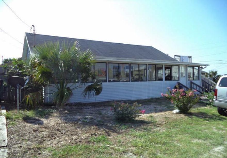 ENJOY UNOBSTRUCTED GULF VIEWS IN THIS CLASSIC FLORIDA COTTAGE! ONE ROW BACK FROM BEACH...STEPS AWAY FROM THE SUGAR WHITE SANDS OF AMERICA'S MOST BEAUTIFUL BEACH...THIS GEM EVOKES THE NOSTALGIA OF OLD FLORIDA. THE KITCHEN HAS BEEN UPDATED. A SHORT WALK TO CAROUSEL MARKET. THIS IS A MUST-SEE PROPERTY IN QUIET LAGUNA BEACH.
