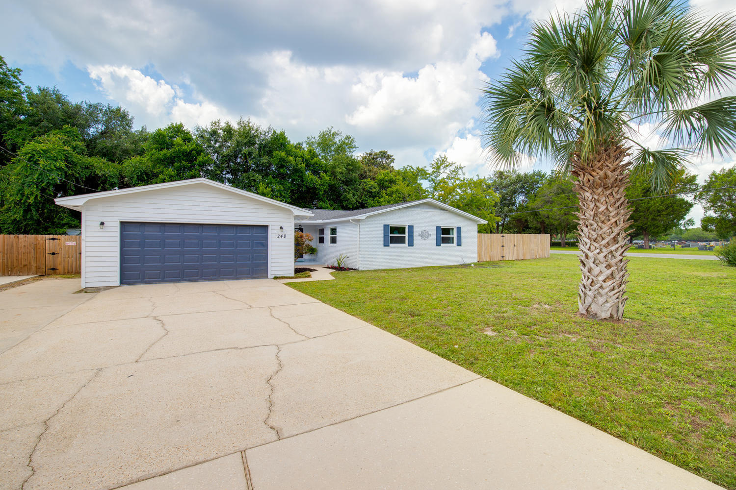 248 NW Pleasant sits on a large fenced corner lot in Central Fort Walton Beach. It has been brought up to date with new wiring, a new electrical panel, a new roof with additional water protection membrane, a new AC (both inside and out), and all new double pane windows. The new owner is sure tol reap the benefits of low insurance and even lower energy bills. A large, eat-in kitchen that has big windows allowing plenty of natural light, an island and a even a pantry! Finishing touches include soft close, custom, white shaker cabinets, glass tile back splash and black stainless appliances. His & hers closets and a classy shiplap accent wall bring the master bedroom to life and the ensuite master bath has a beautifully tiled walk in shower and a frameless glass door. A large living area with fireplace, formal dining room, 2 car garage (and plenty of additional parking) check all the boxes a new buyer could want or need. Only bedroom curtain rods convey, other items for staging only.