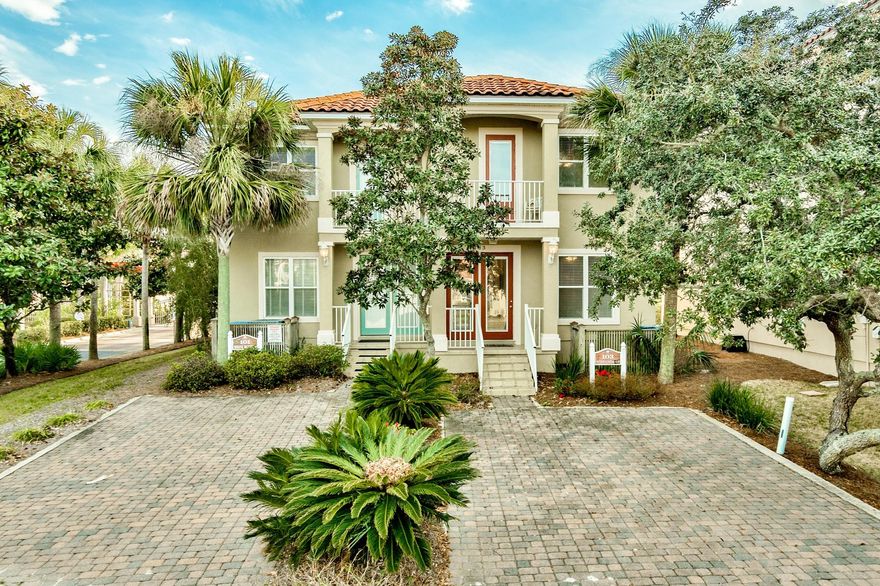 Fantastic home situated across the street from the beach within the gated community of La Valencia, a Mediterranean style complex with upscale amenities including a clubhouse with pool, lounge and fitness center and a beautiful Gulf front pool and sun deck to enjoy along with deeded beach access. Prime location on the west end of Panama City Beach close to Pier Park and prestigious communities of 30A. Upon entry you will notice beautiful wainscoting down the tiled hallway. This floor plan conveniently offers all 3 bedrooms downstairs and a spacious living & dining area, kitchen and bunk area upstairs to maximize the Gulf views. Capture the views from the interior or relax, dine & entertain on the outdoor balcony facing the Gulf. This would be a prime full time residence or vacation rental. The lower level master suite features direct access to a covered patio with slight Gulf views and backyard. There is a walk-in closet and en-suite bathroom with a Jacuzzi tub to unwind in, tile floors and a separate walk-in shower. The two guest bedrooms are also located on the first floor and share a bathrooms that can be accessed from either room or the hallway. There is an owners closet in the hallway downstairs which is an easy spot to stow beach gear and a laundry room with a full size washer & dryer. 

Hardwood stairs bring you to the upper level with the main living areas. The open floor plan and raised ceilings make this property great for family gatherings and entertainment. There is a breakfast bar seating four for a more casual setting and an additional dining area. The large open kitchen has white appliances and plenty of storage with the ample cabinets and pantry. Need a little more sleeping space? No problem! There is a bunk room (complete with triple bunks!!) and a full bathroom upstairs as well. There is a Juliette balcony off this area to enjoy and a larger Gulf view balcony off the living area. Enjoy music outside while entertaining as there are surround sound speakers in and out of the home. Outdoor ceiling fans have been updated and exterior is in good shape - stucco recalled and painted last January. The living area is spacious with two couches and additional chair seating. Recessed lighting and high ceilings is an additional feature for this floor. The curb appeal is exceptional with tropical landscaping and a paver stone driveway. The subdivision is nicely maintained by the HOA and is a great community. Enjoy beach living and the coastal lifestyle everyone desires for an affordable cost. La Valencia has a tennis court, two pools (one beach side), deeded beach access and a gorgeous clubhouse with fitness room. This is an easy show and will not last long!